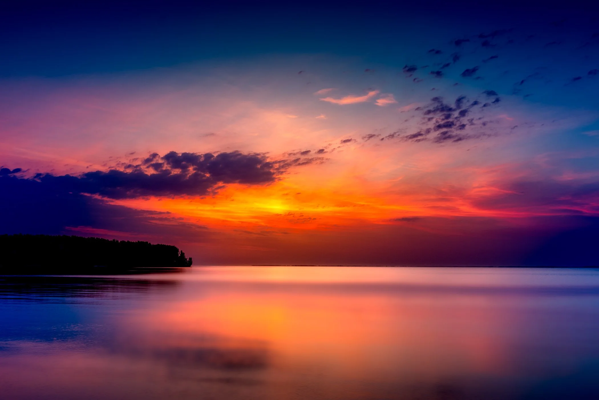 Dawn Over the Dnipro A dramatic panoramic perspective of the first light washing across the Kyiv Sea reservoir.