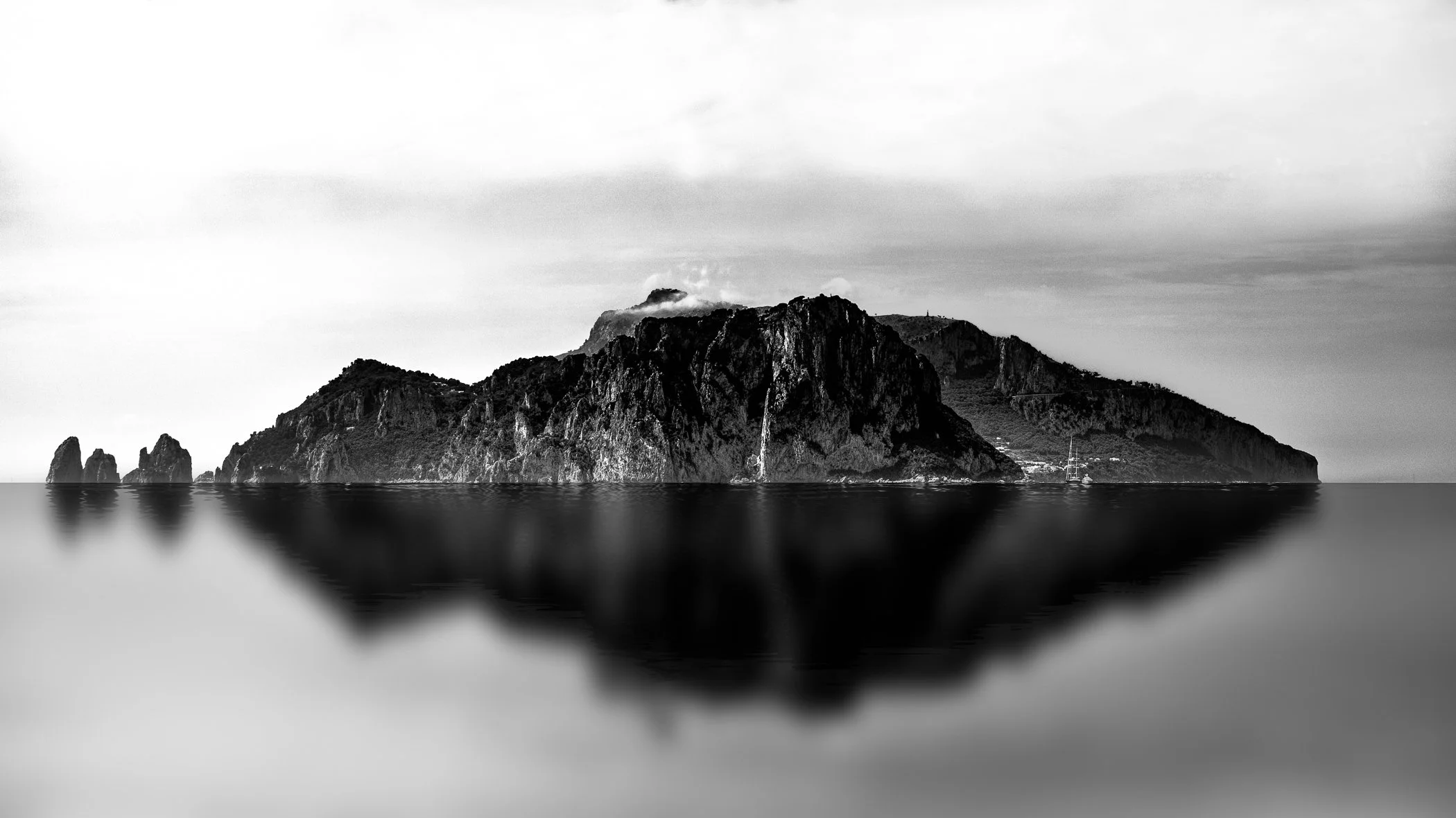 The Isle of Capri A fine art seascape capturing the iconic profile of Capri rising out of the Mediterranean waters.