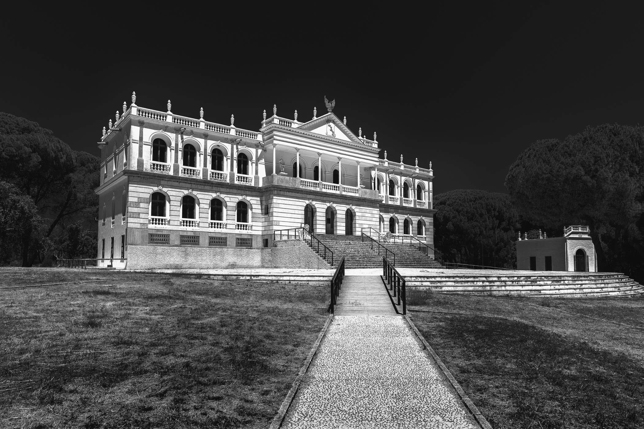 The White House in Doñana Stark white architectural walls contrasting beautifully against serene, surrounding natural landscapes.