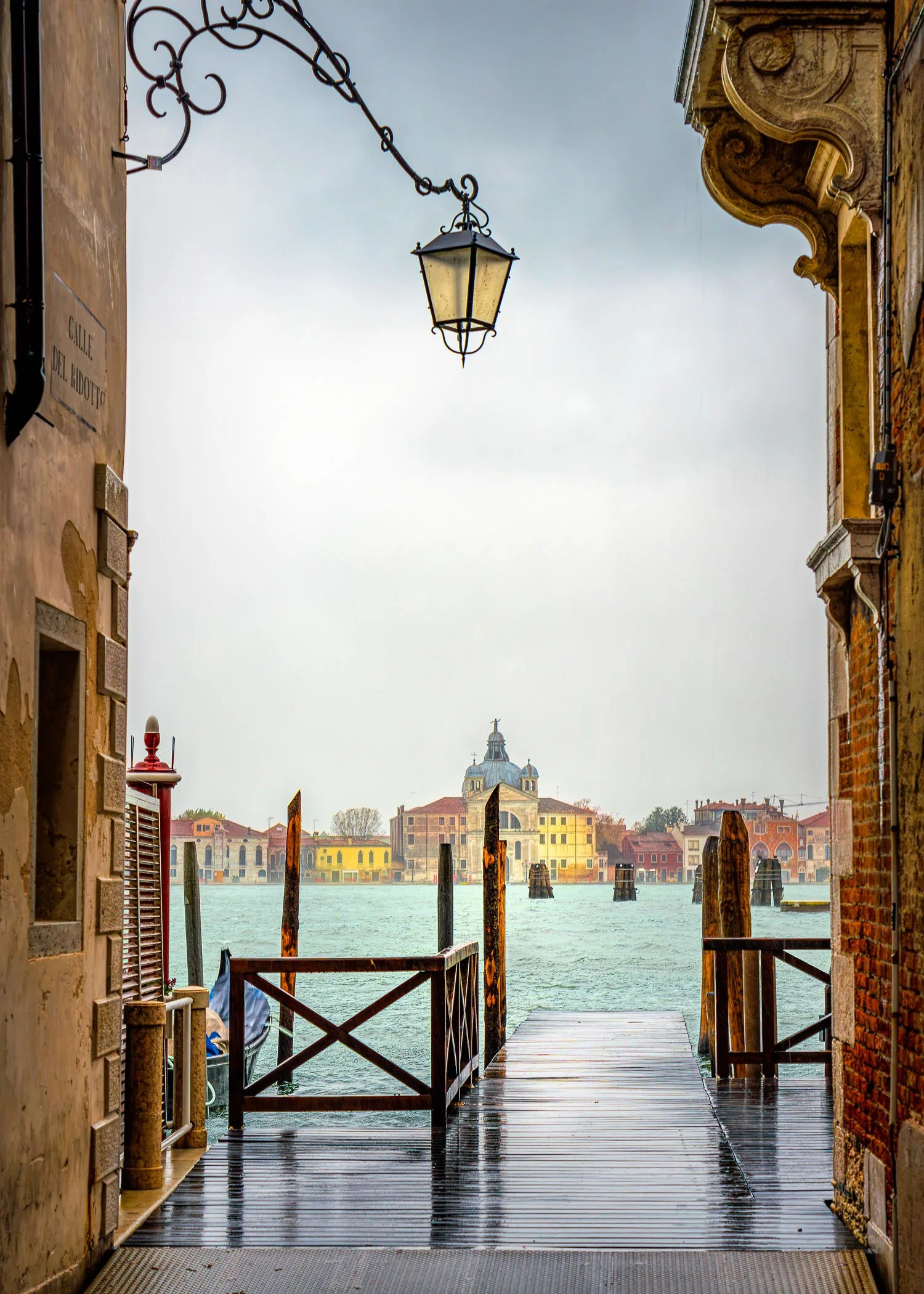 A Wet Day in Venice Rain-slicked stones and misty canals capturing the moody romance of a drizzly afternoon.