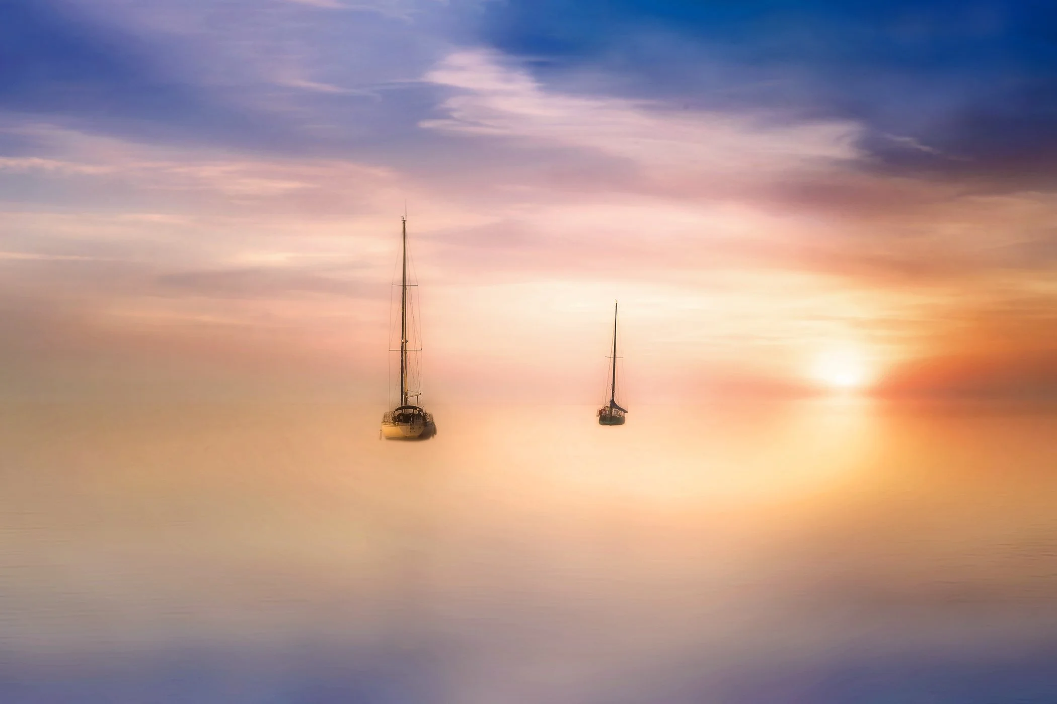 Ethereal Calm in Collioure A peaceful coastal view capturing soft diffused light and smooth water movement along the bay.