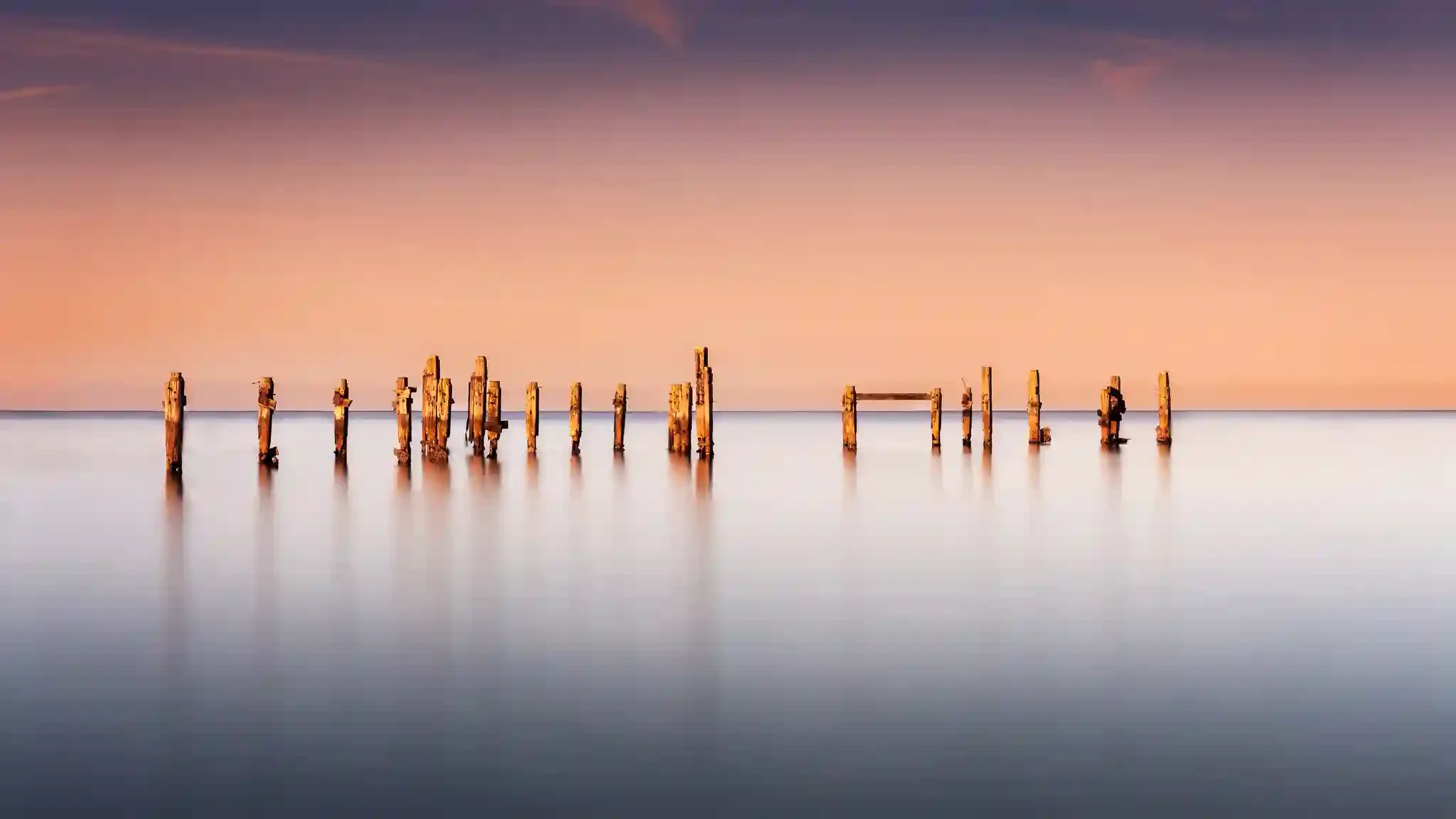 The old pier at Swanage around sunset