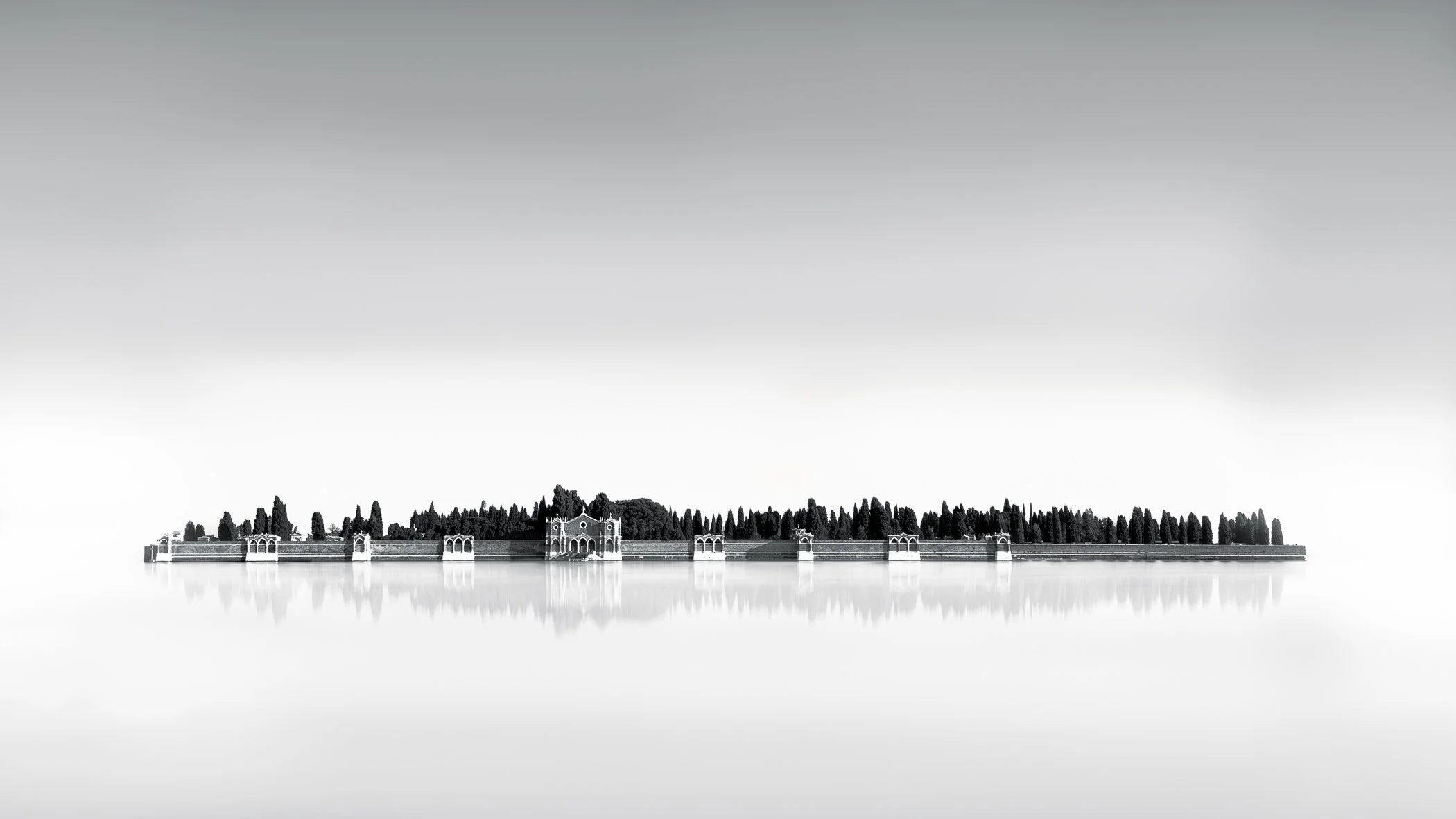 Eternal Reflections Symmetrical reflections of minimalist wooden structures floating seamlessly on still, glassy water.