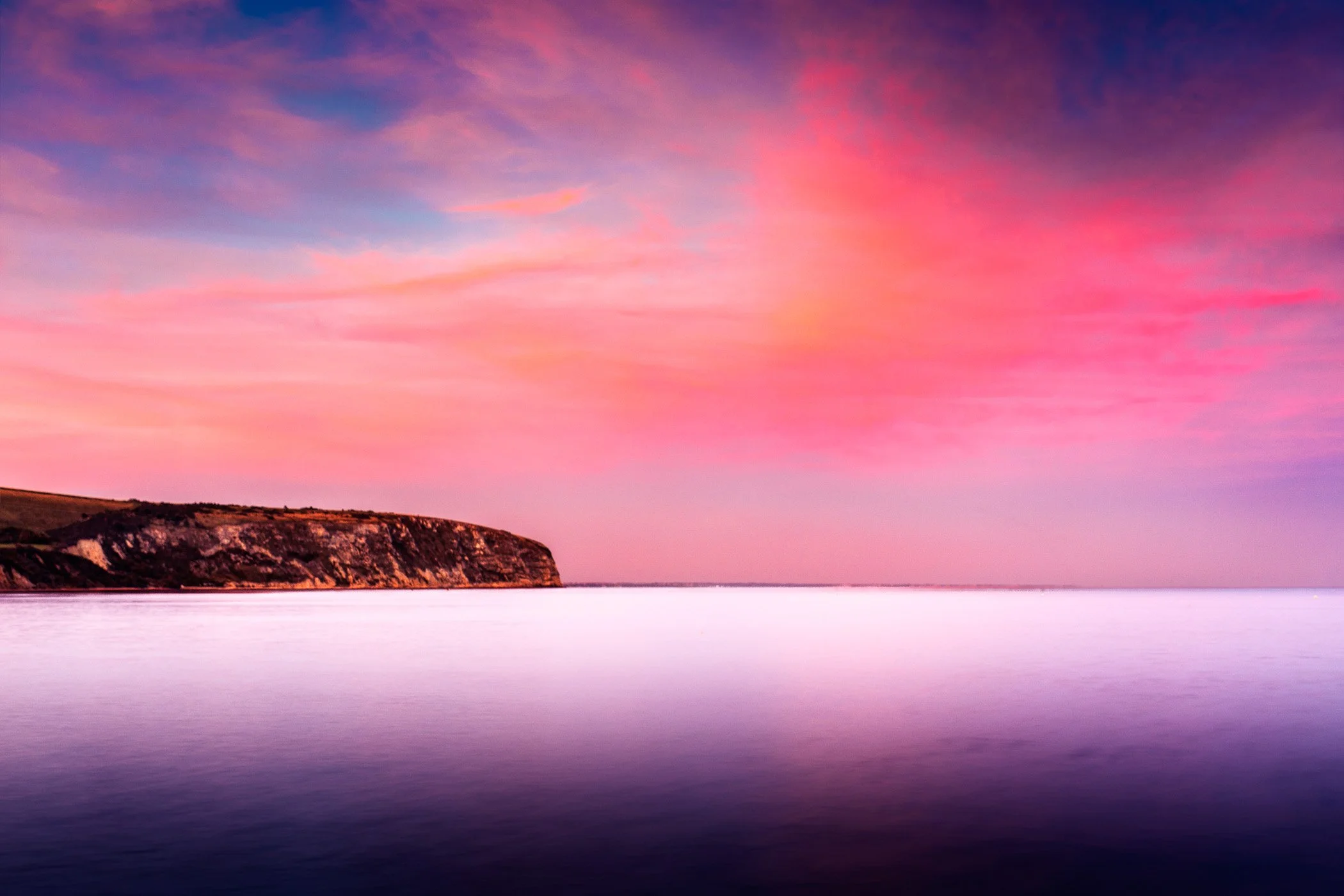 Twilight Stillness An ethereal fine art photo capturing the soft, dreamlike transition between sunset and nightfall over the sea.