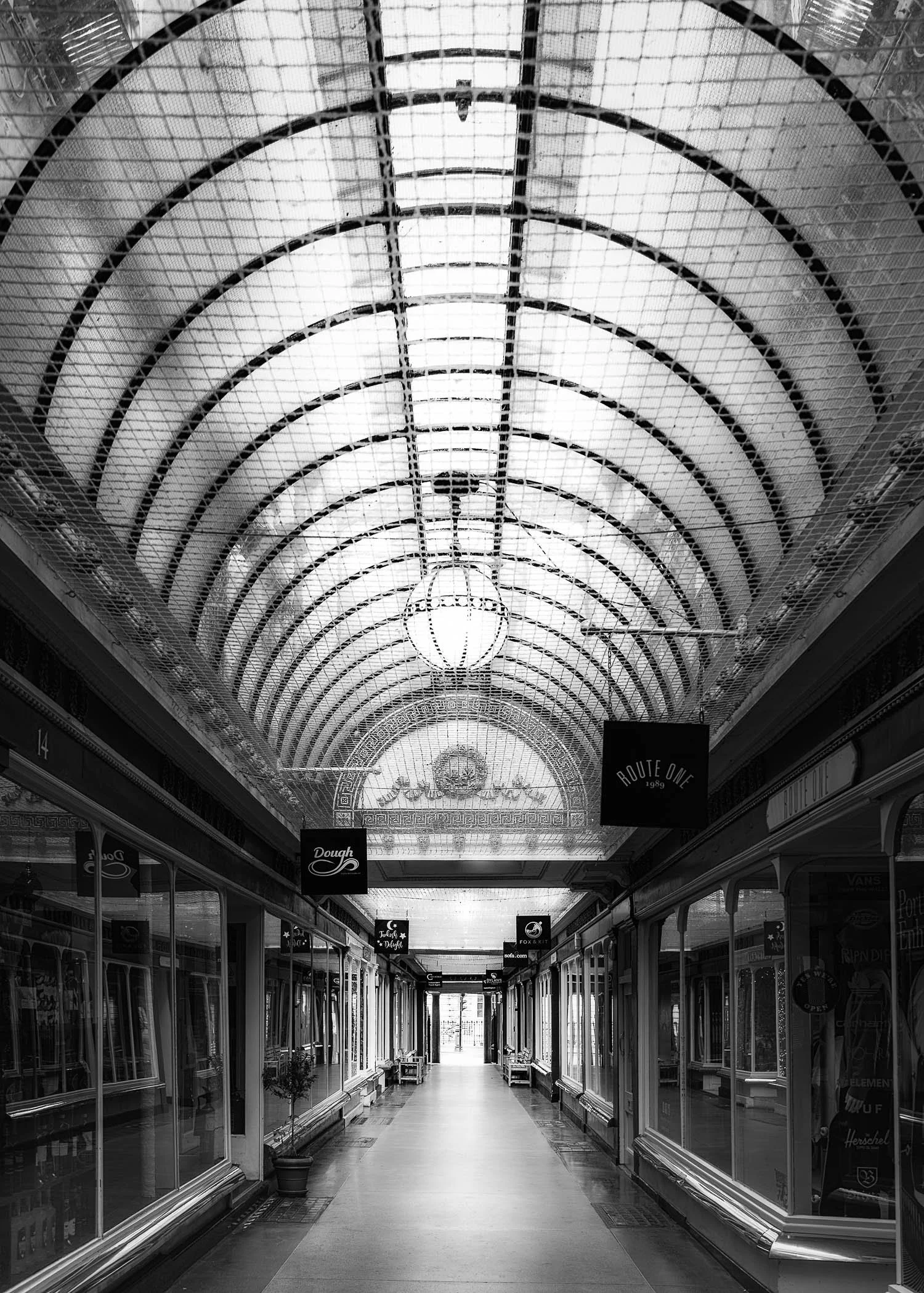 The Corridor An interior view of the historic glass-roofed shopping arcade built in 1825.