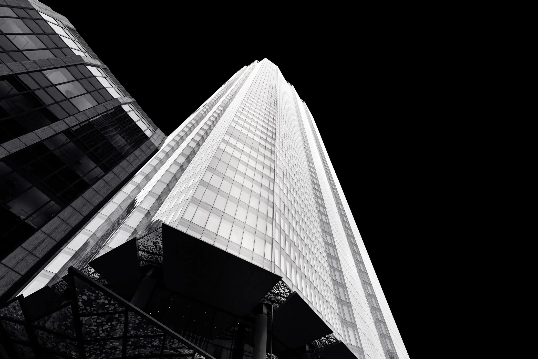 22 Bishopsgate A towering monochrome view showcasing the soaring vertical height and geometric grandeur of the landmark skyscraper.