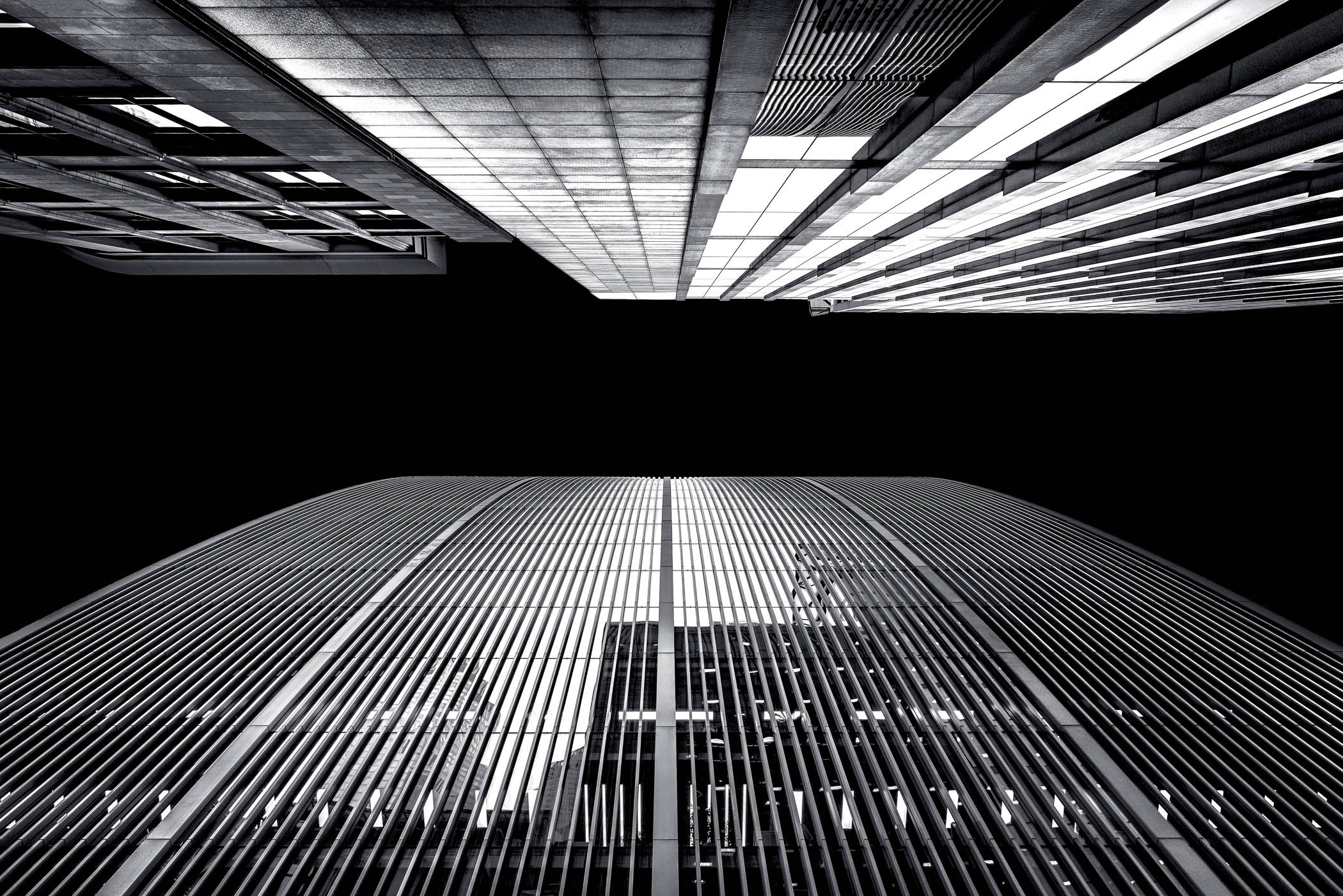 Urban Symmetry in the Heart of London A striking low-angle study of sleek geometric facades and bold structural symmetry in central London.