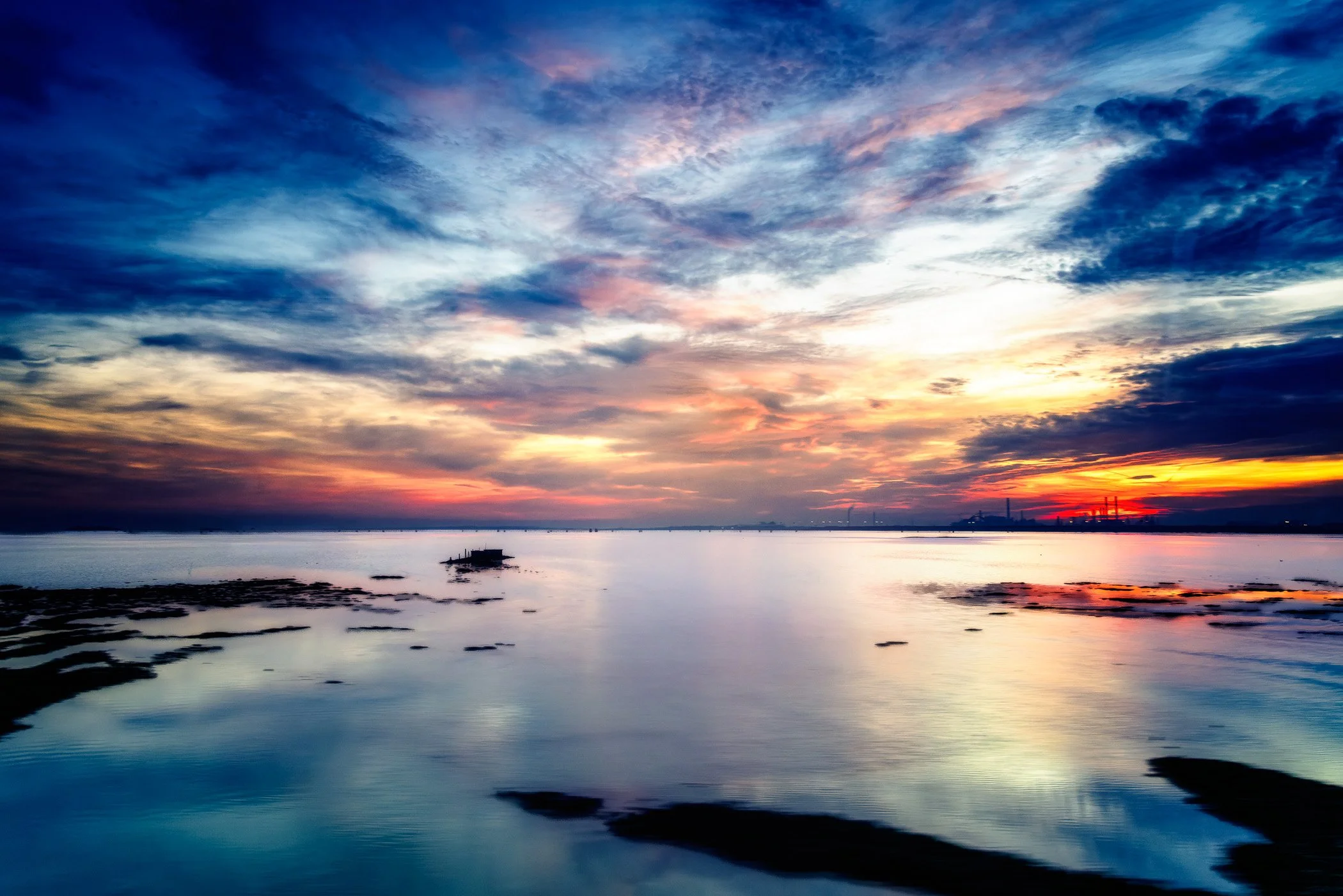 Stillness Before Venice A minimalist fine art view emphasizing space, silence, and soft atmospheric haze looking toward the Venetian coastline.