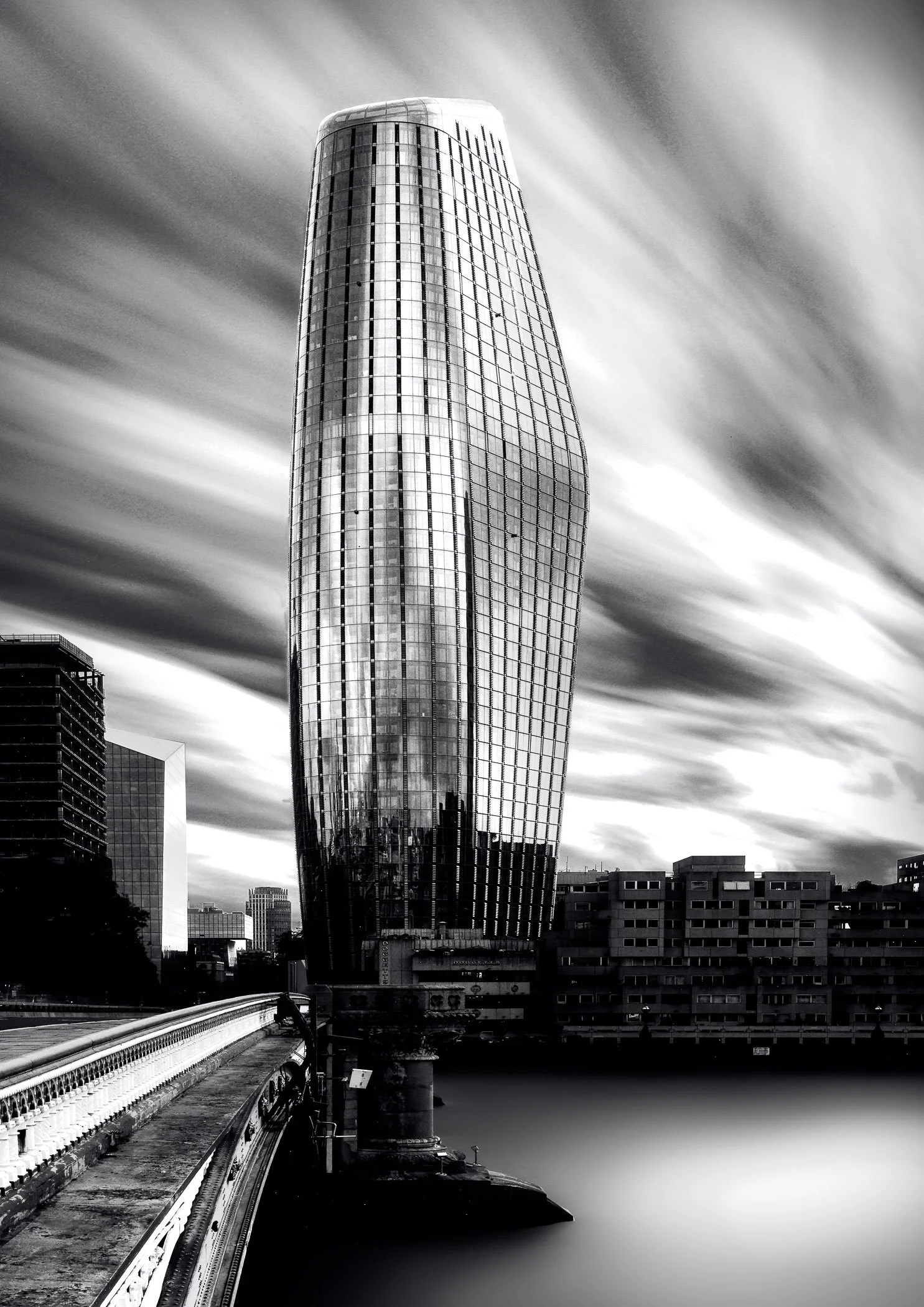 The Boomerang in Motion A long-exposure study of modern London architecture highlighting dynamic geometric lines and ambient motion.