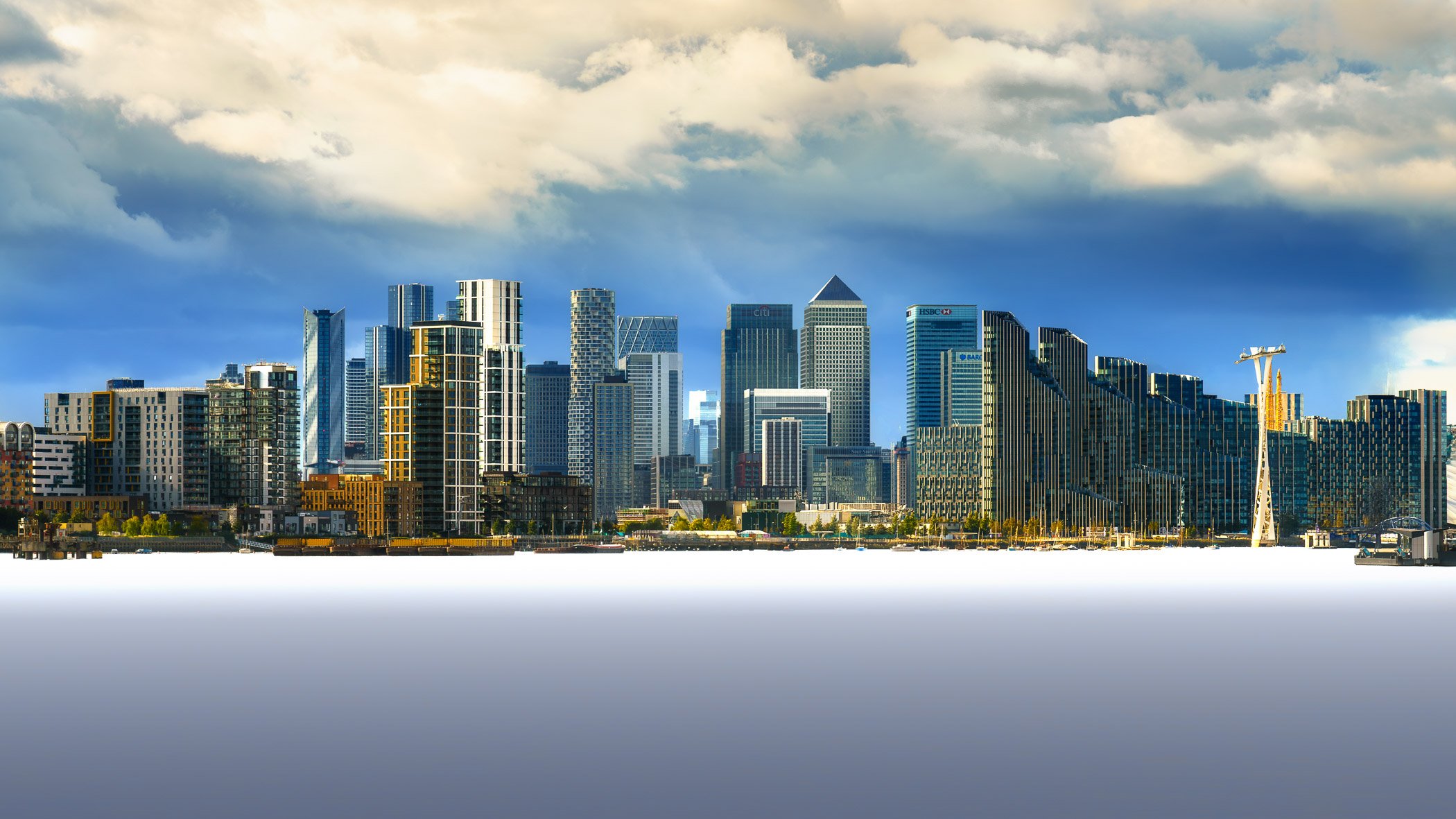 Towers of Canary Wharf A striking skyline view of the modern skyscrapers and high-rises dominating Canary Wharf along the Thames.
