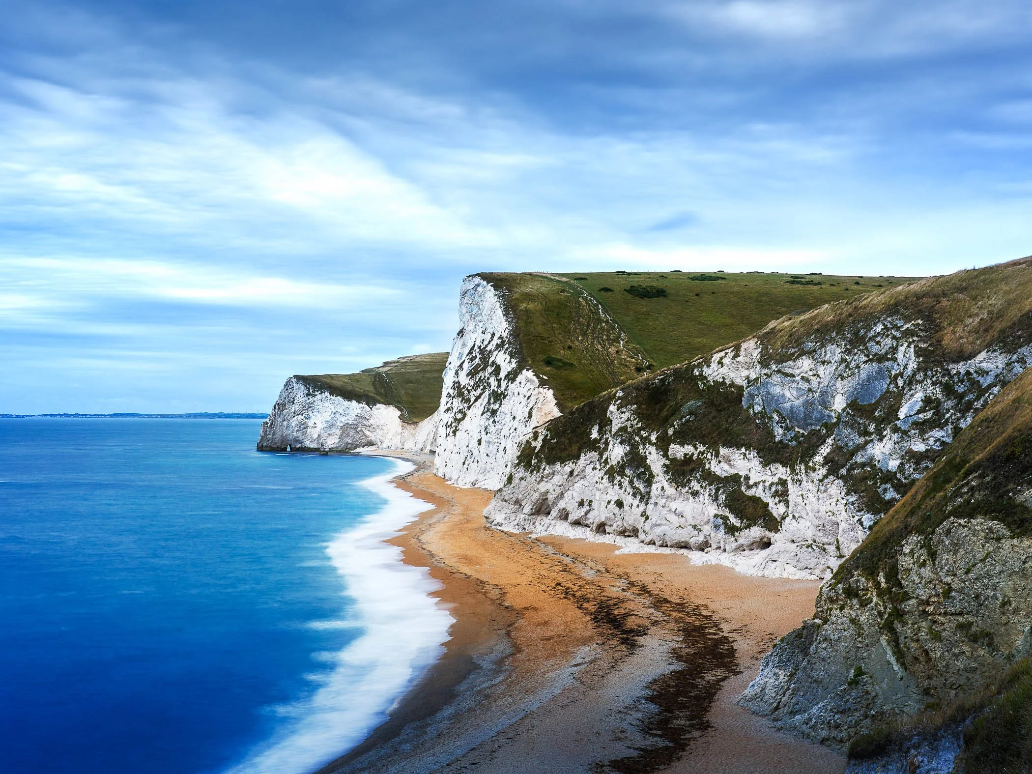 Chalk Cliffs A grand fine art shot highlighting the brilliant white chalk cliff faces contrasting against the deep blue sea.