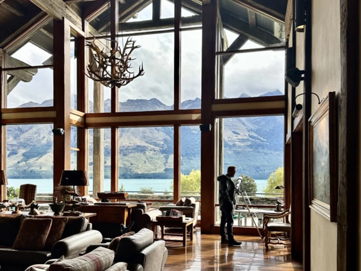 Interior of Blanket Bay Lodge overlooking Lake Wakatipu and the Southern Alps in New Zealand