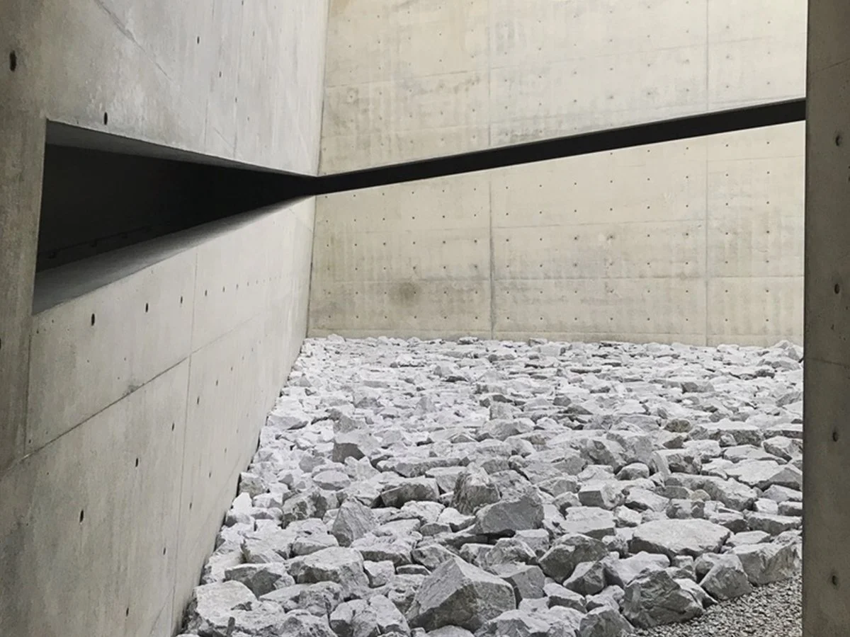Concrete museum architecture designed by Tadao Ando on Naoshima Island overlooking the Seto Inland Sea