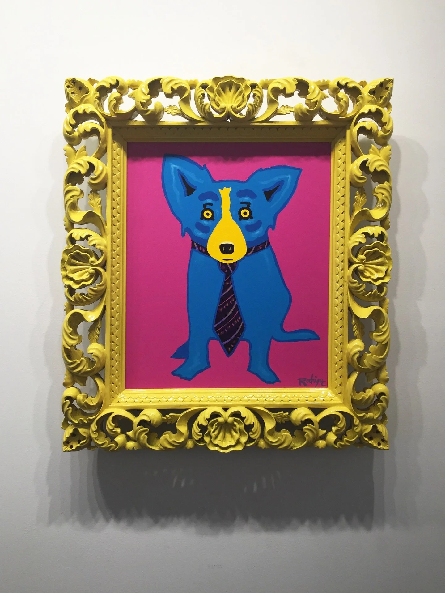 The Blue Dog by George Rodrigue feels right at home here&mdash;bold, watchful, unmistakably Louisiana. A symbol of place and spirit, much like the New Orleans Jazz &amp; Heritage Festival, which begins today.

The air feels different. Music spills in