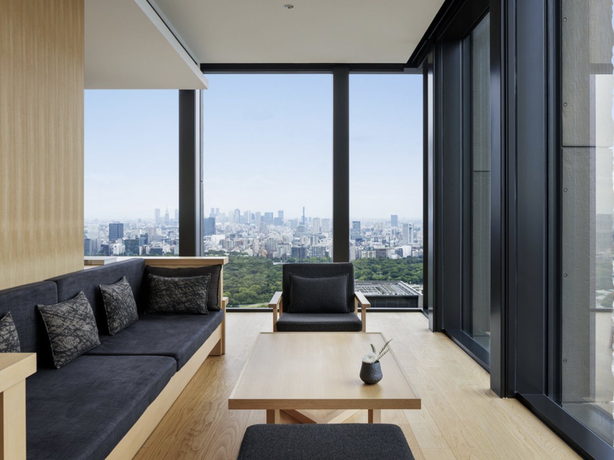 Tokyo skyline seen through floor-to-ceiling windows from a suite at Aman Tokyo