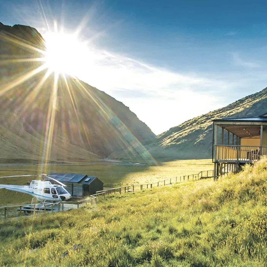 Helicopter arrival at Minaret Station Alpine Lodge in the Southern Alps of New Zealand