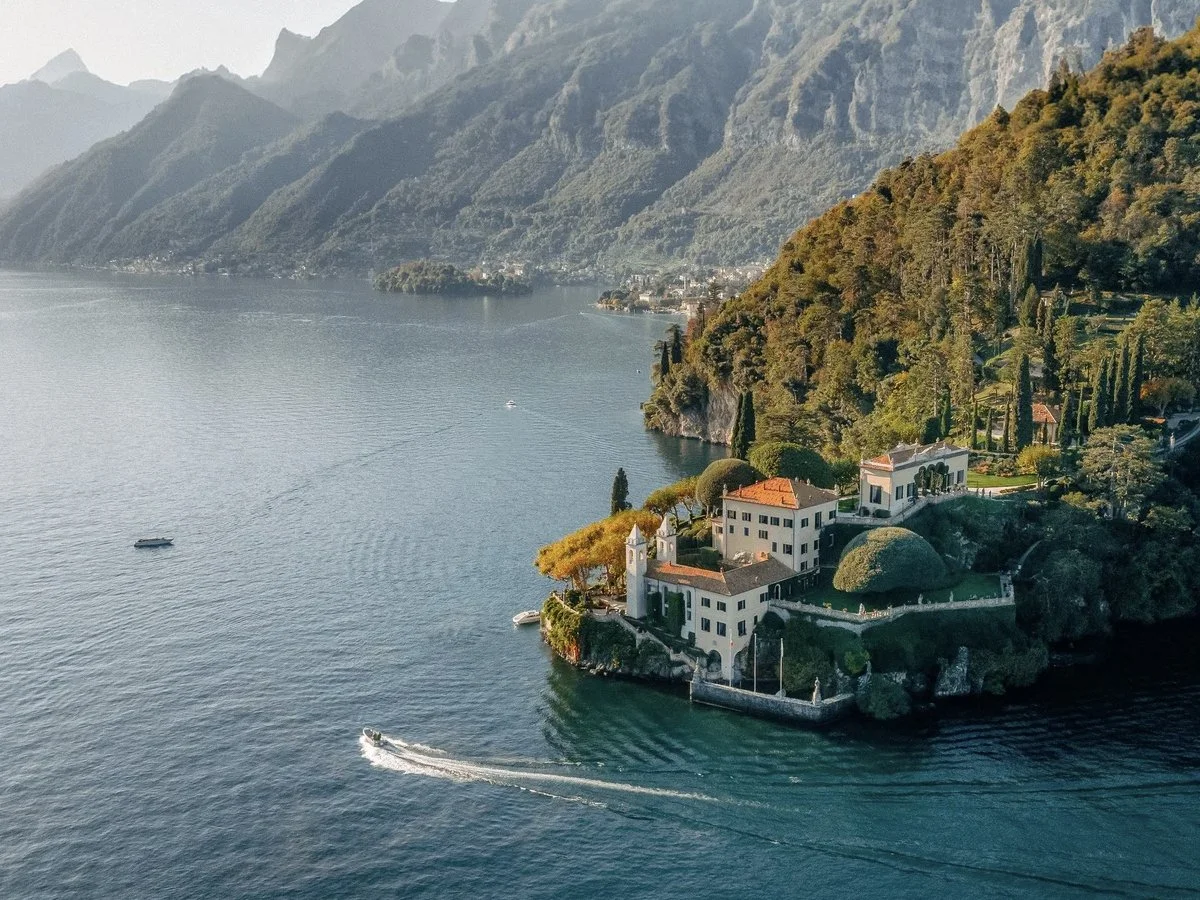 Aerial view of Lake Como surrounded by dramatic alpine mountains along the Switzerland–Italy border