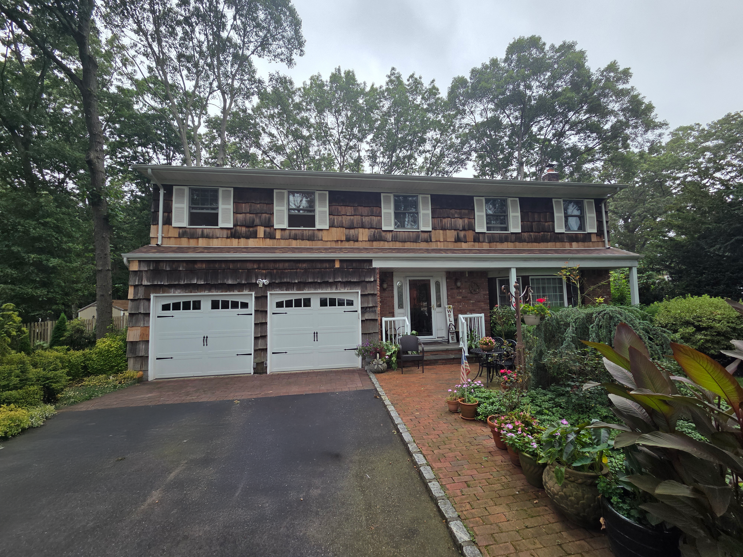 Original Huntington home prior to renovation and front porch addition.