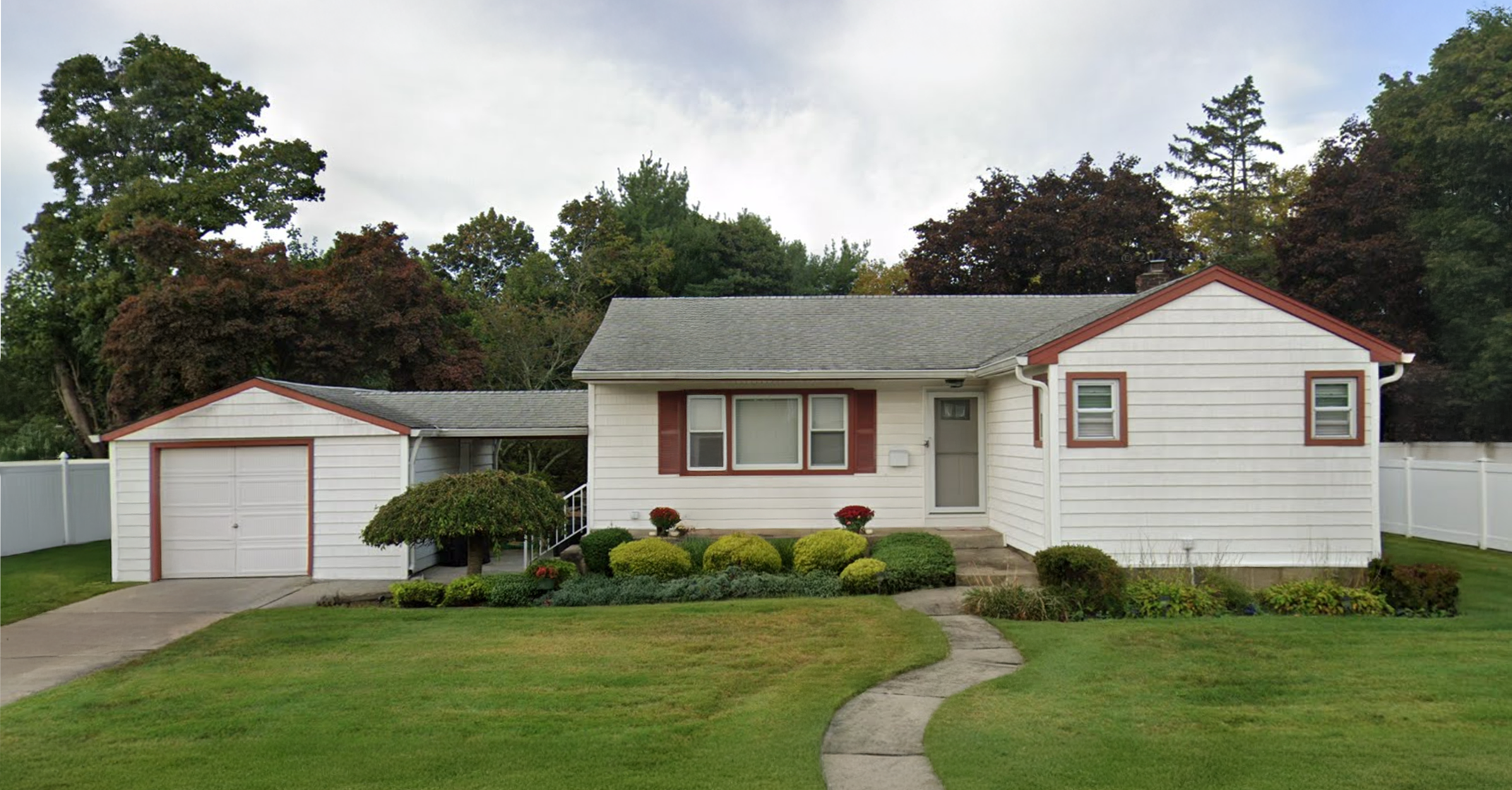 Existing single-story Long Island home prior to architectural renovation and addition designed by Americana Architects.