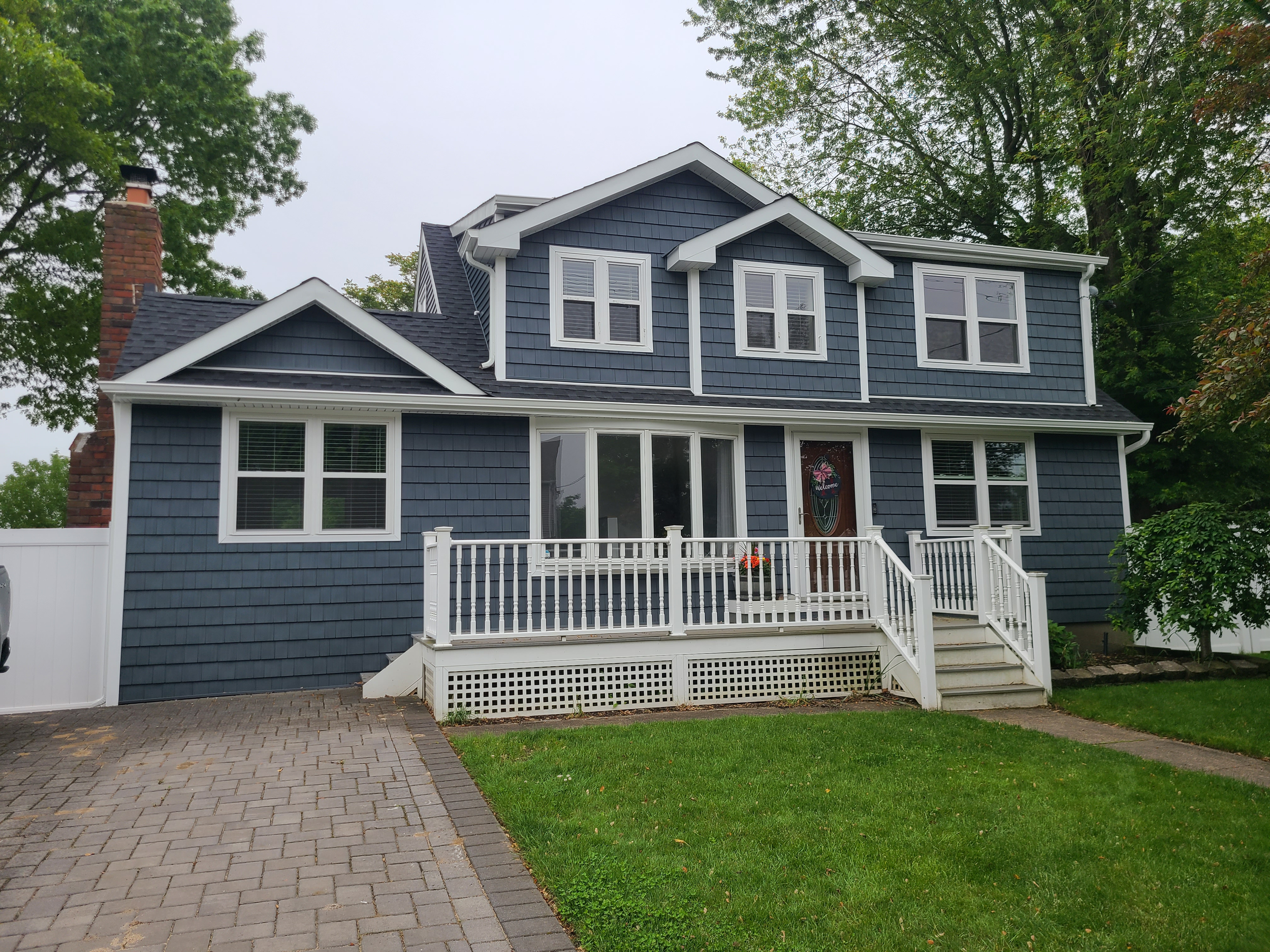 Completed second floor addition and full home renovation by Americana Architects for Suffolk County.