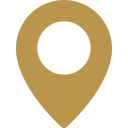 A gold location pin icon on a white background.