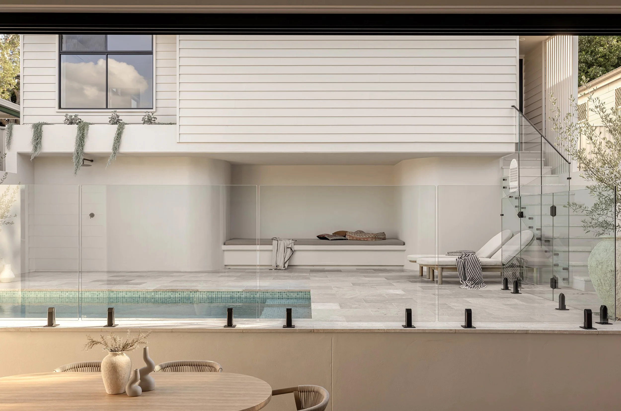 2-kahibah modern oasis travertine pool deck.jpg