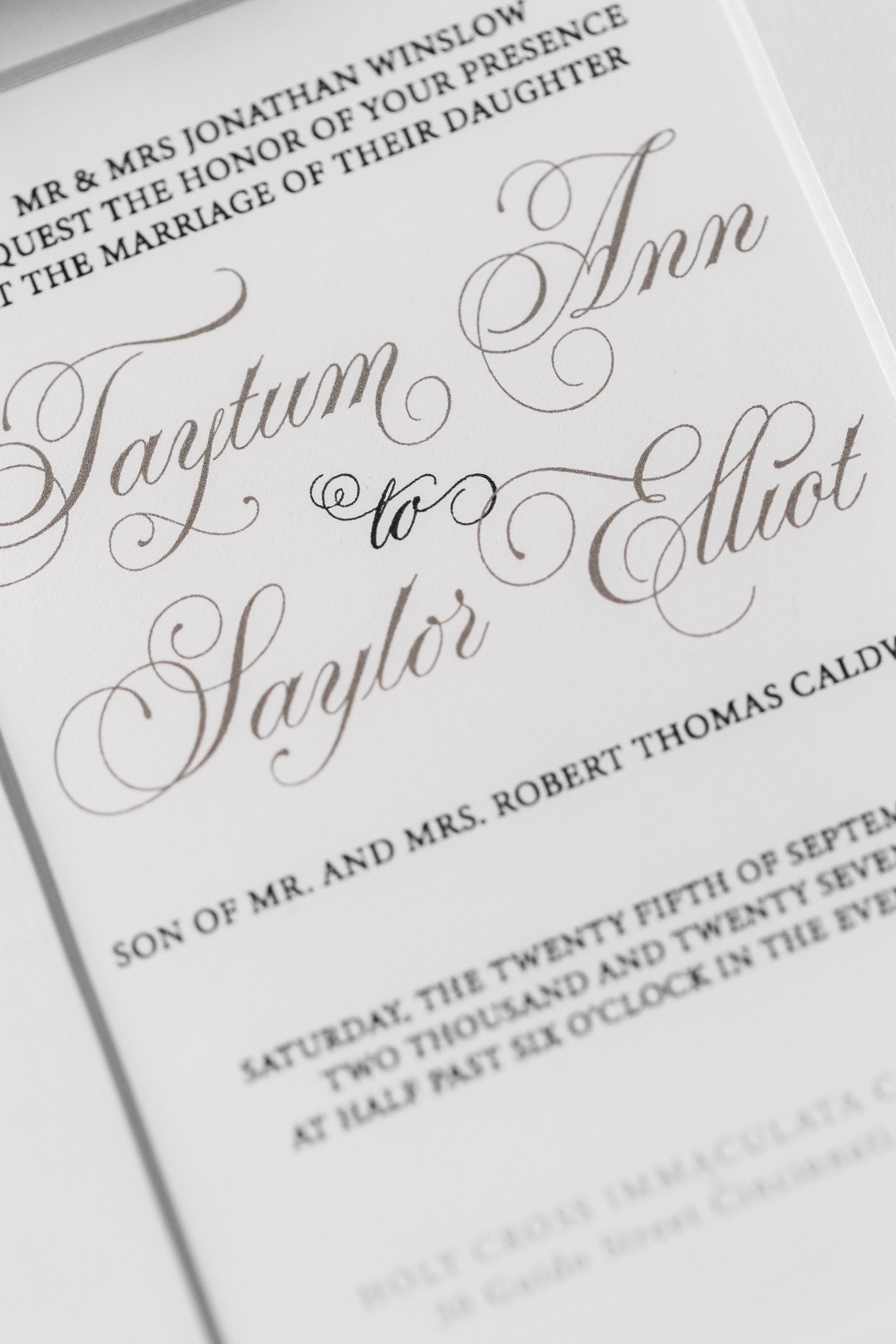 Crisp black digital printing pairs an elegant script with a refined serif, offering timeless typography beneath the soft layering of the matte overlay.