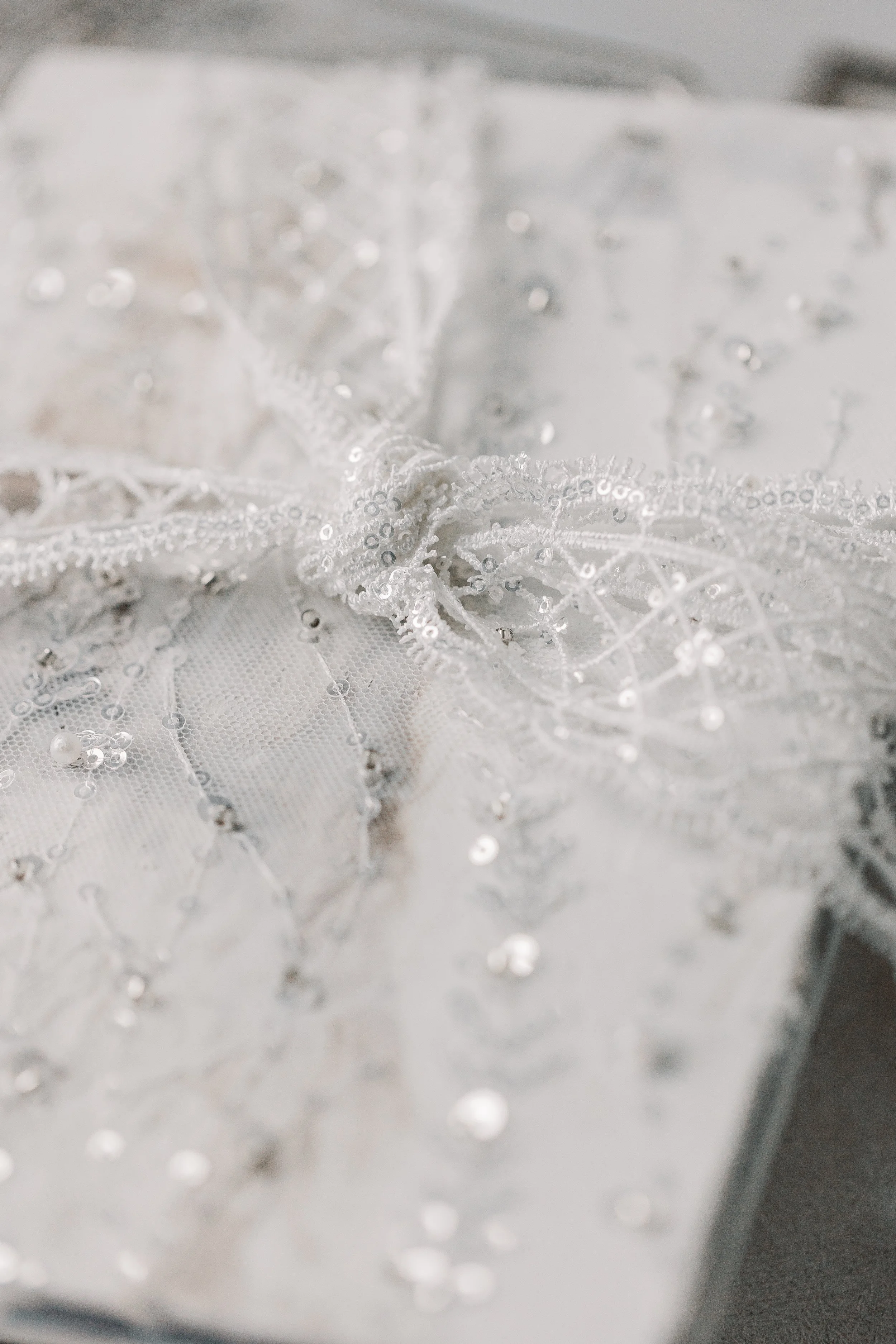 Each ribbon individually knotted, trimmed, and sealed for quality and consistency.