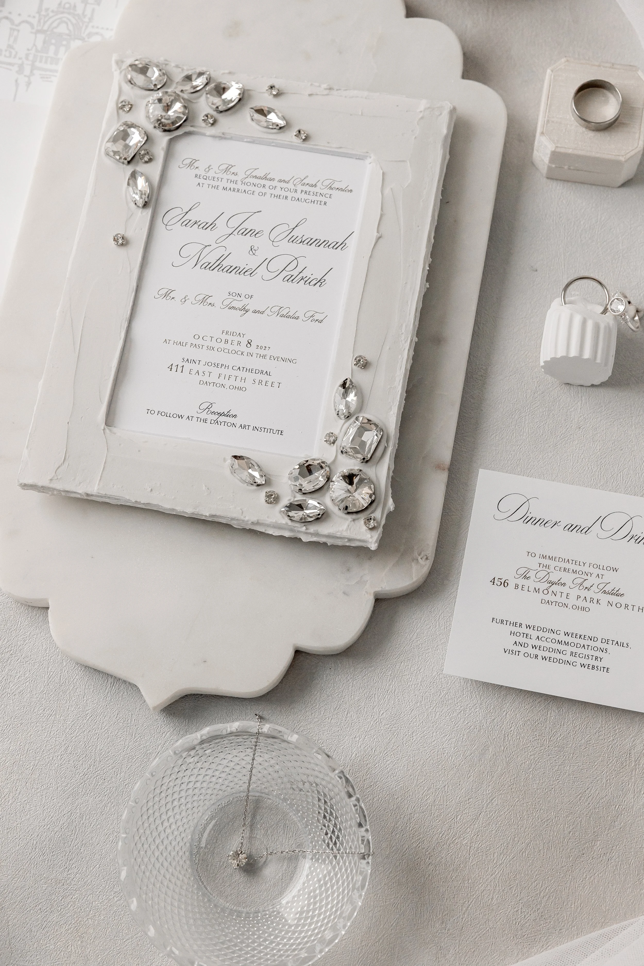 Hand-Set Stone Detailing. Each stone individually placed for light-catching texture and dimension.