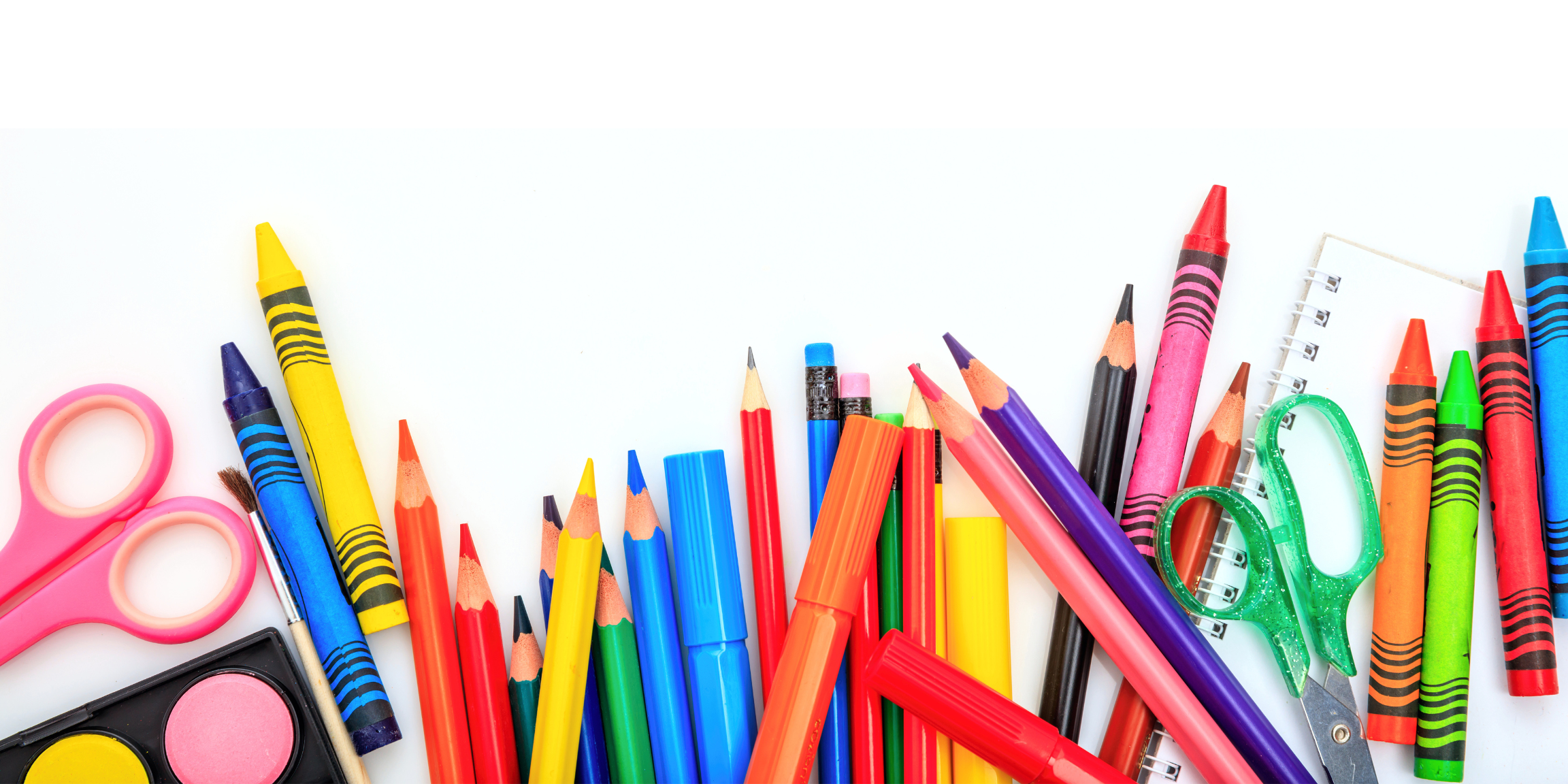Arrangement of colorful school supplies on a white background, including scissors, markers, colored pencils, watercolors, pens, erasers, and notebooks.