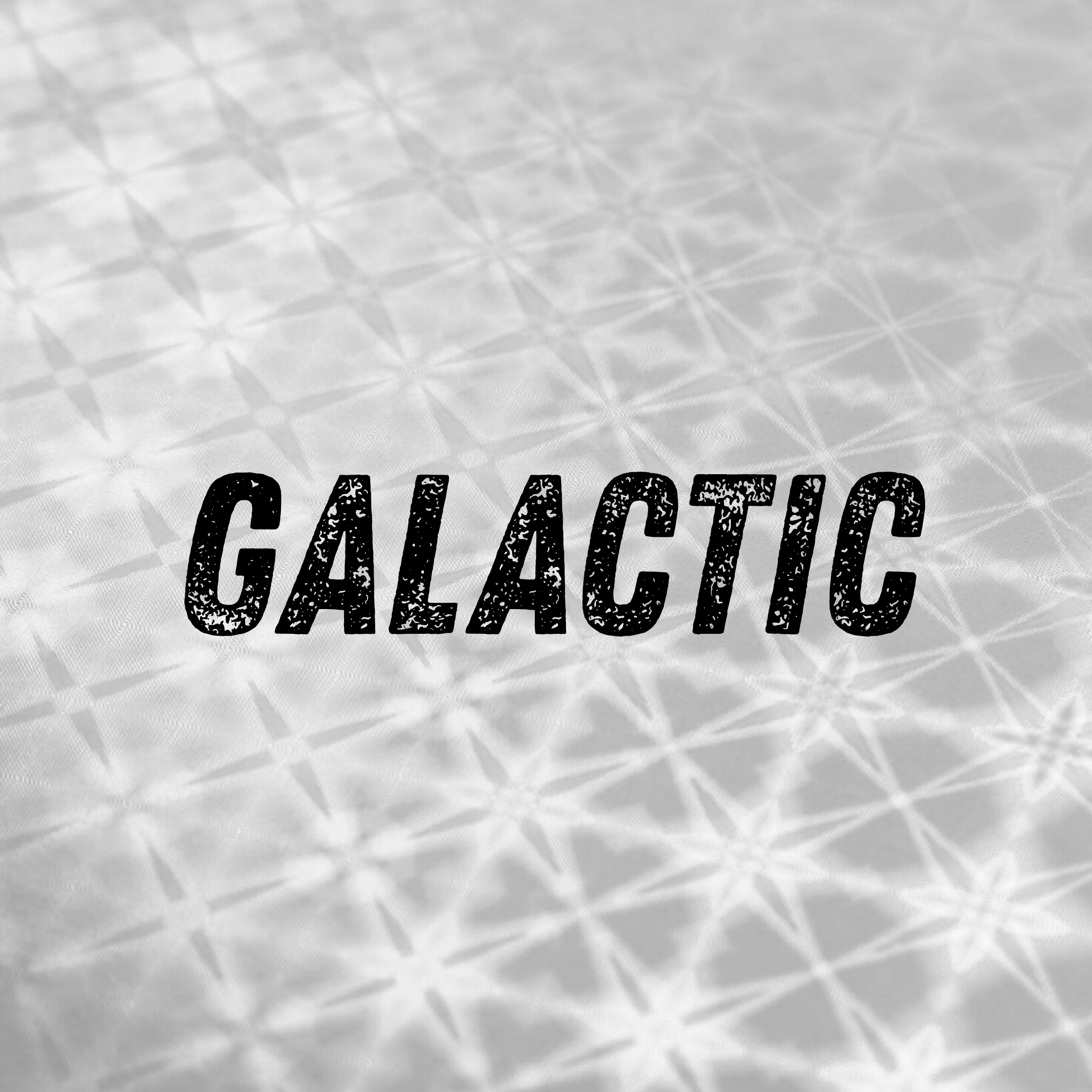 The word 'GALACTIC' in bold, black, textured letters on a white, patterned background.