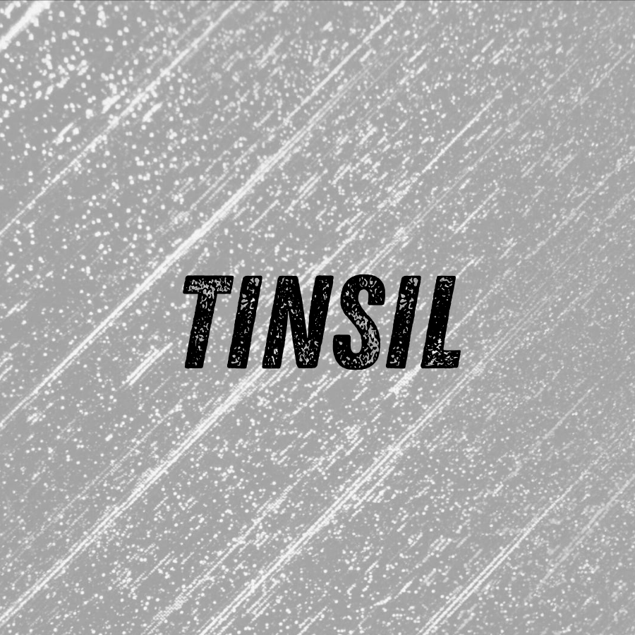The word 'TINSIL' inverted in black text on a textured gray background.