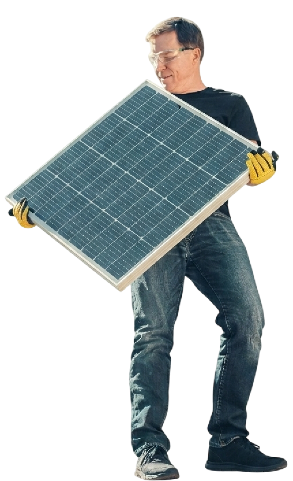 A man wearing safety glasses and work gloves holding a solar panel.