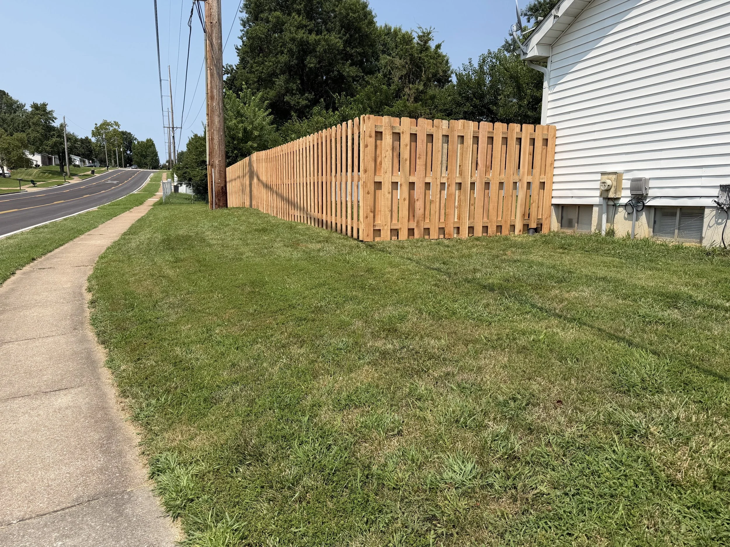 Side picture of a Cedar shadowbox fence in St. Charles, MO