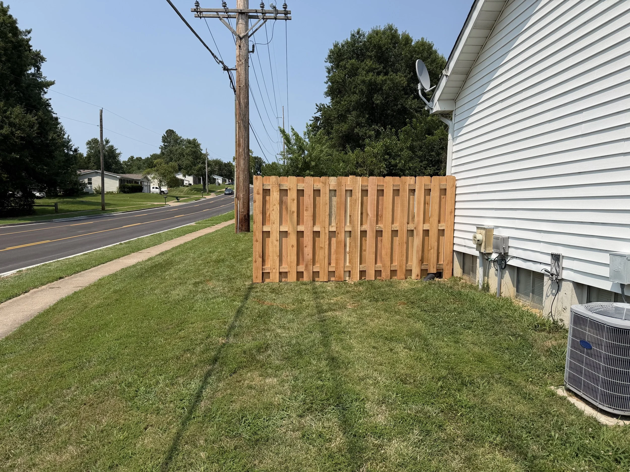 Side yard picture of cedar shadowbox fence in St. Charles, MO