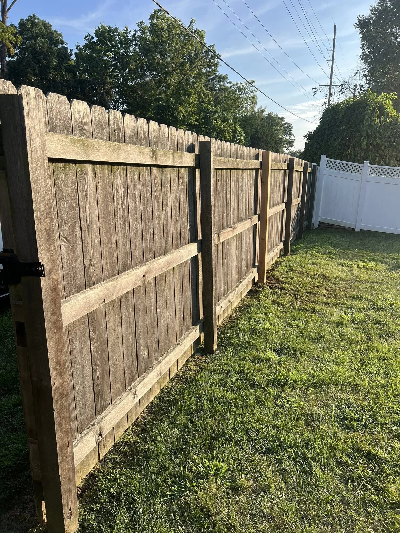 AFTER - brown wood fence in backyard - Midwest Fence