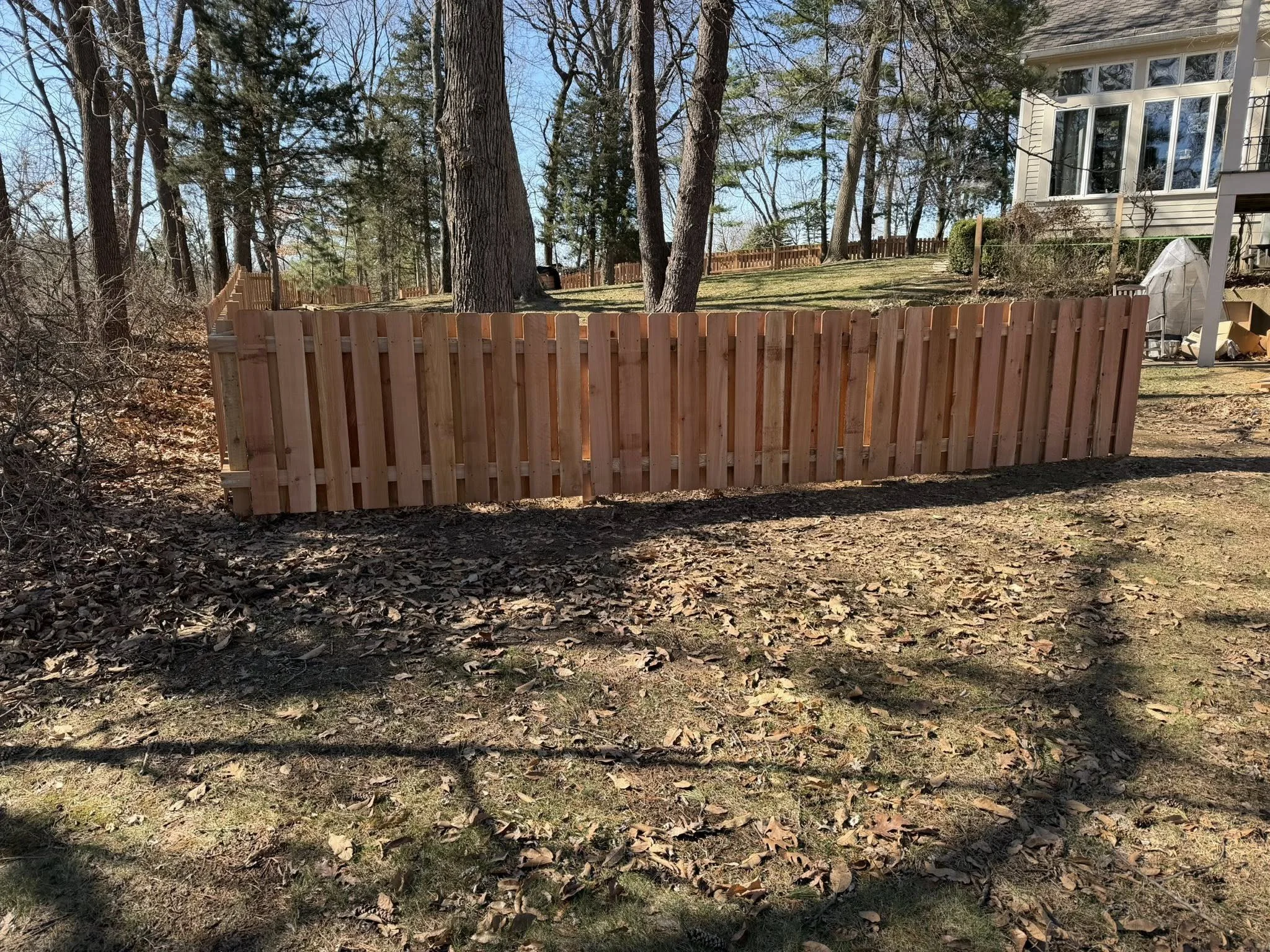 Cedar wood fence in backyard - Midwest Fence