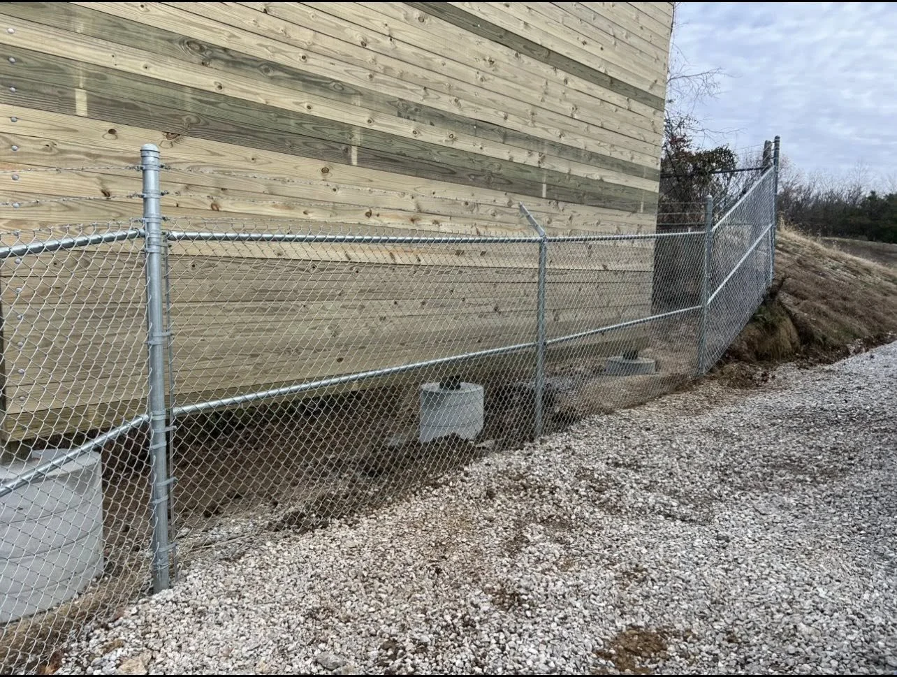 grey chain link fence around business - Midwest Fence