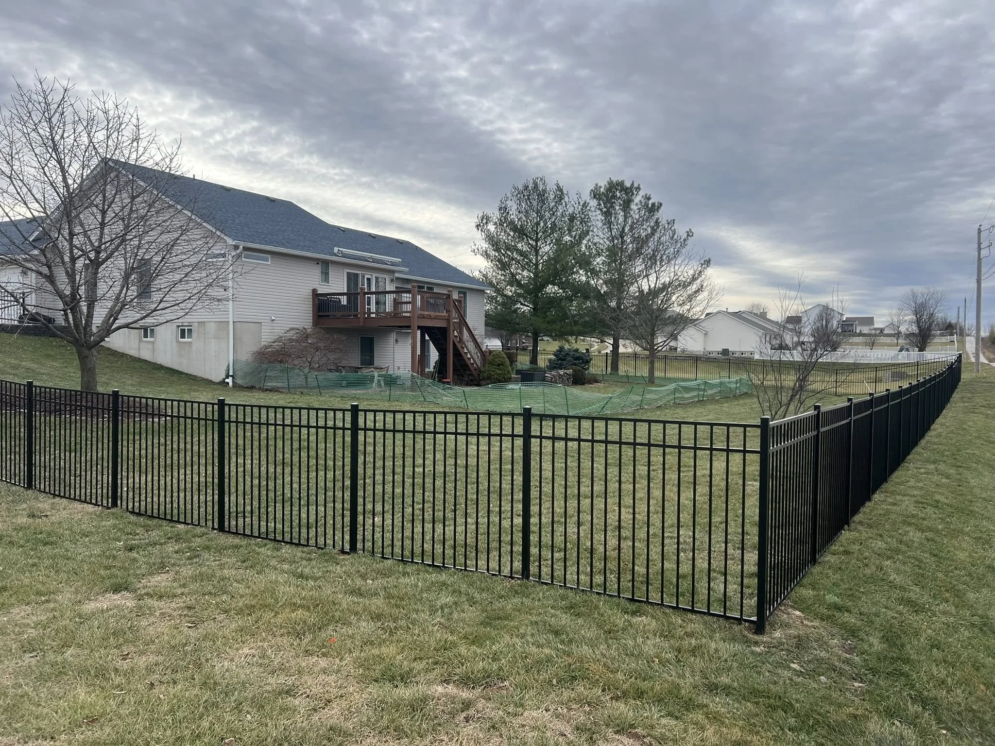 black ornamental aluminum fence in backyard - Midwest Fence
