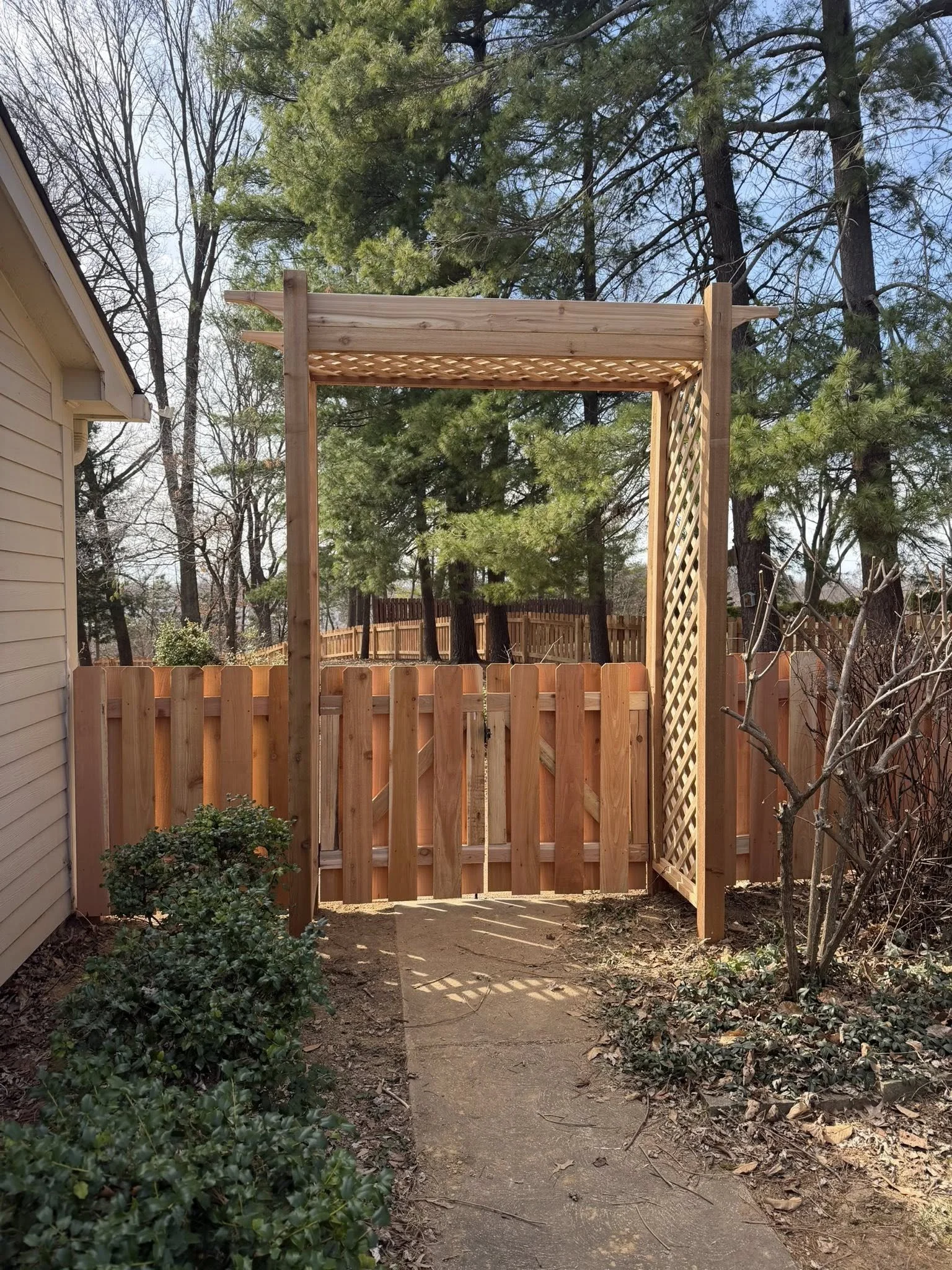 Cedar wood fence gate with arbor pergola - Midwest Fence