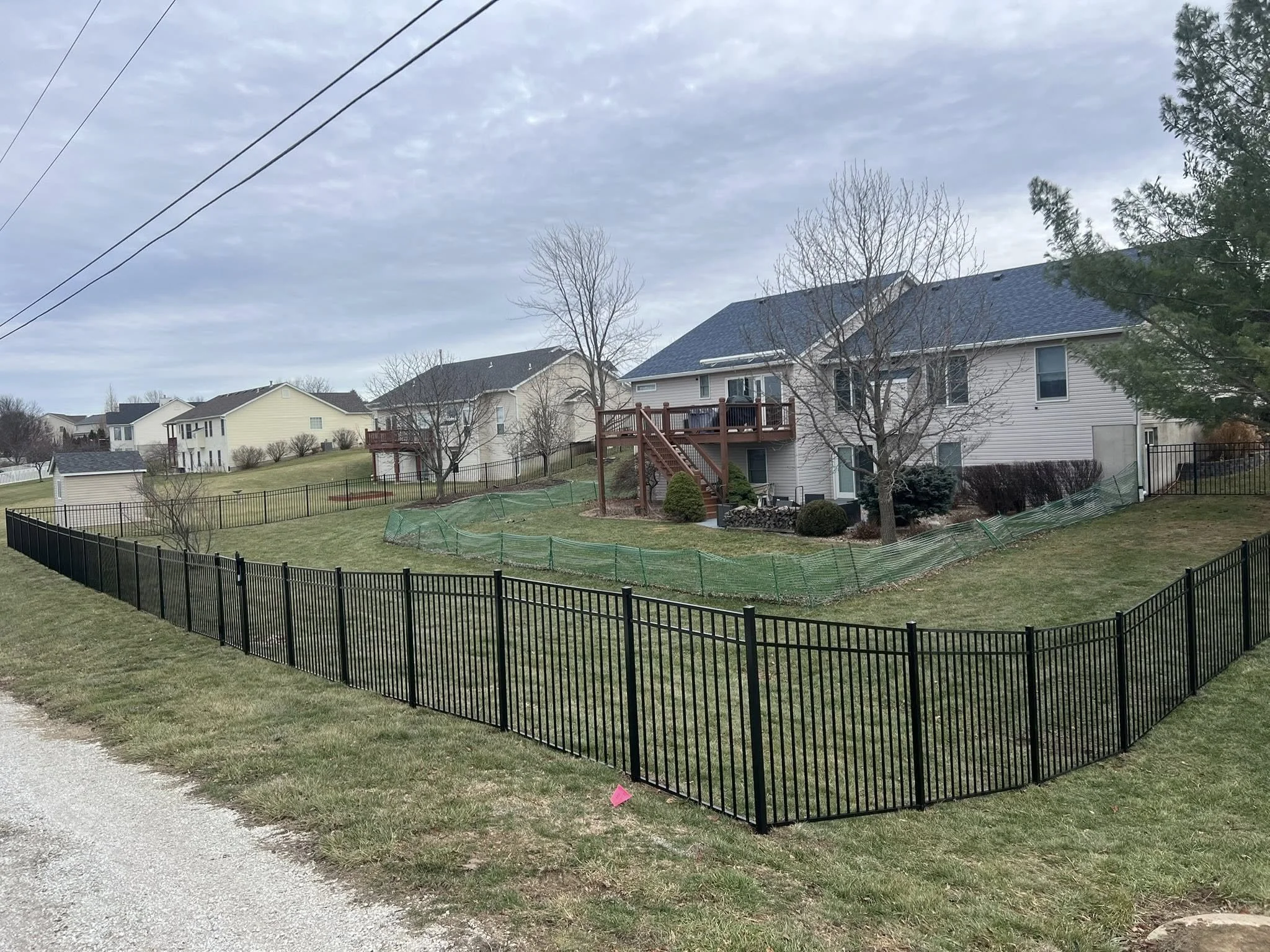 black ornamental aluminum fence in backyard - Midwest Fence