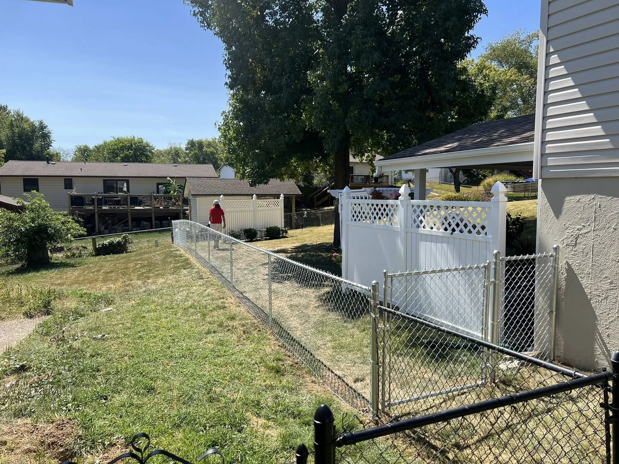 grey chain link fence in backyard - Midwest Fence
