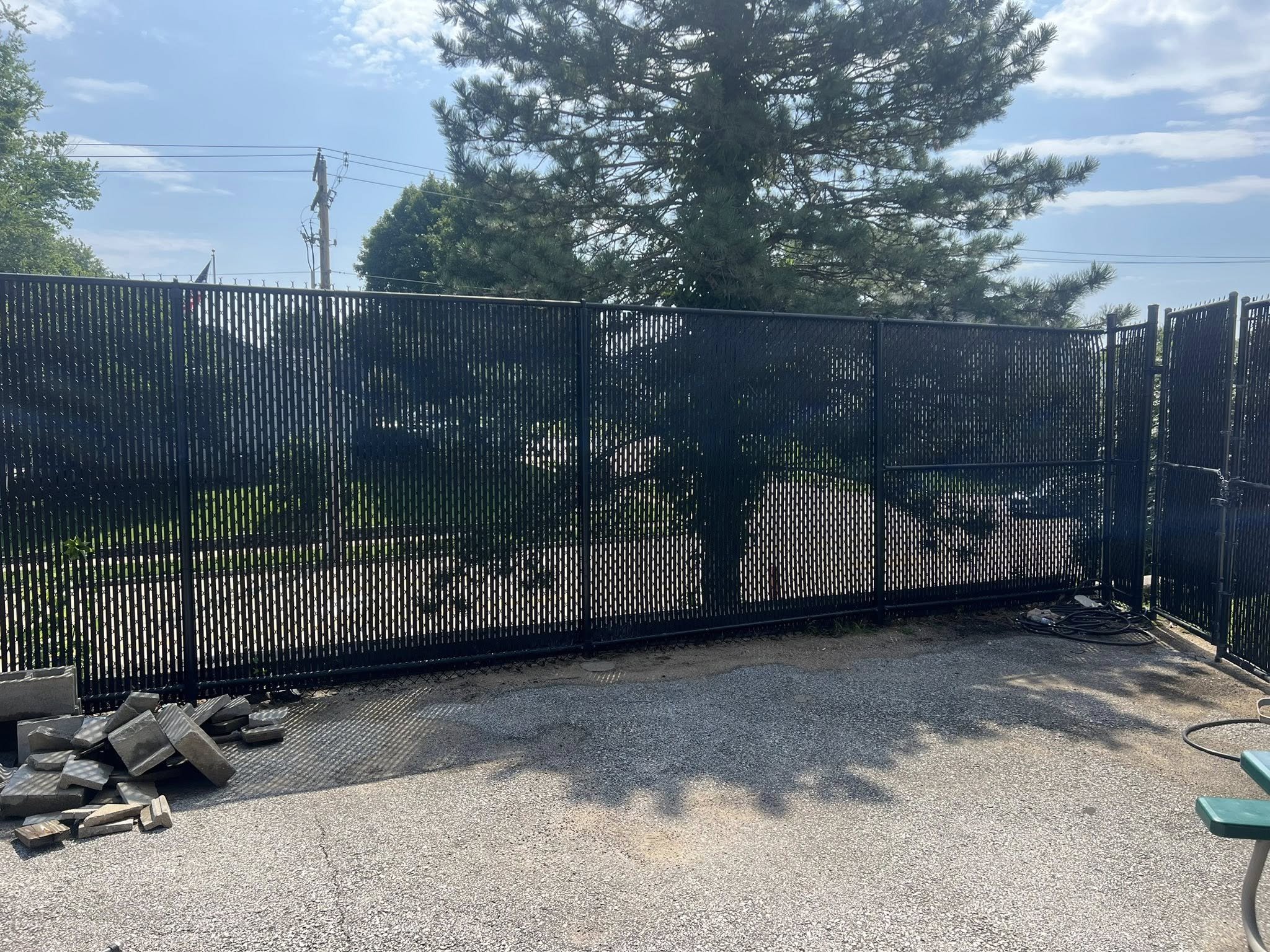 tall chain link fence with privacy slats - Midwest Fence