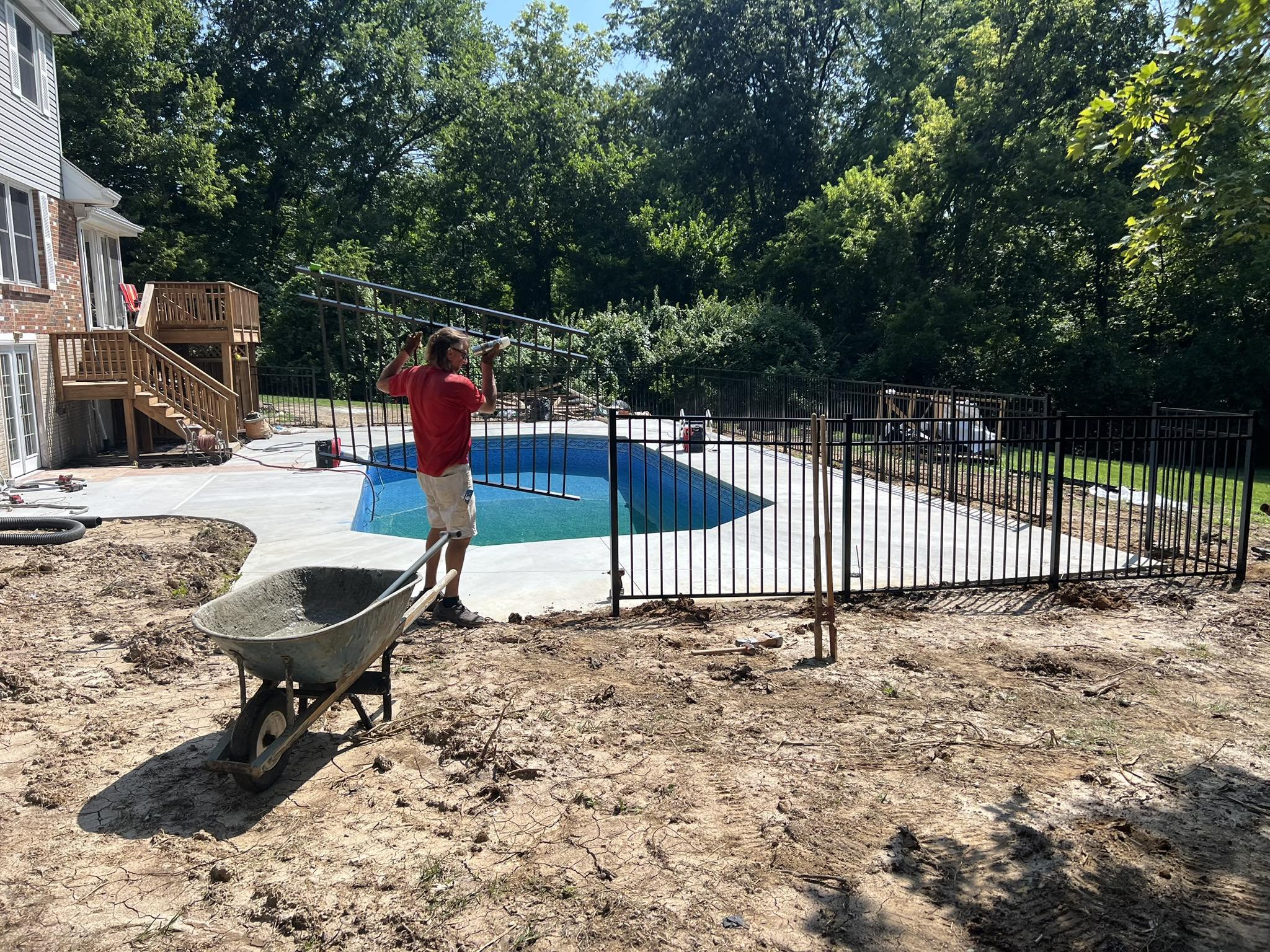 black aluminum fence around a pool - Midwest Fence