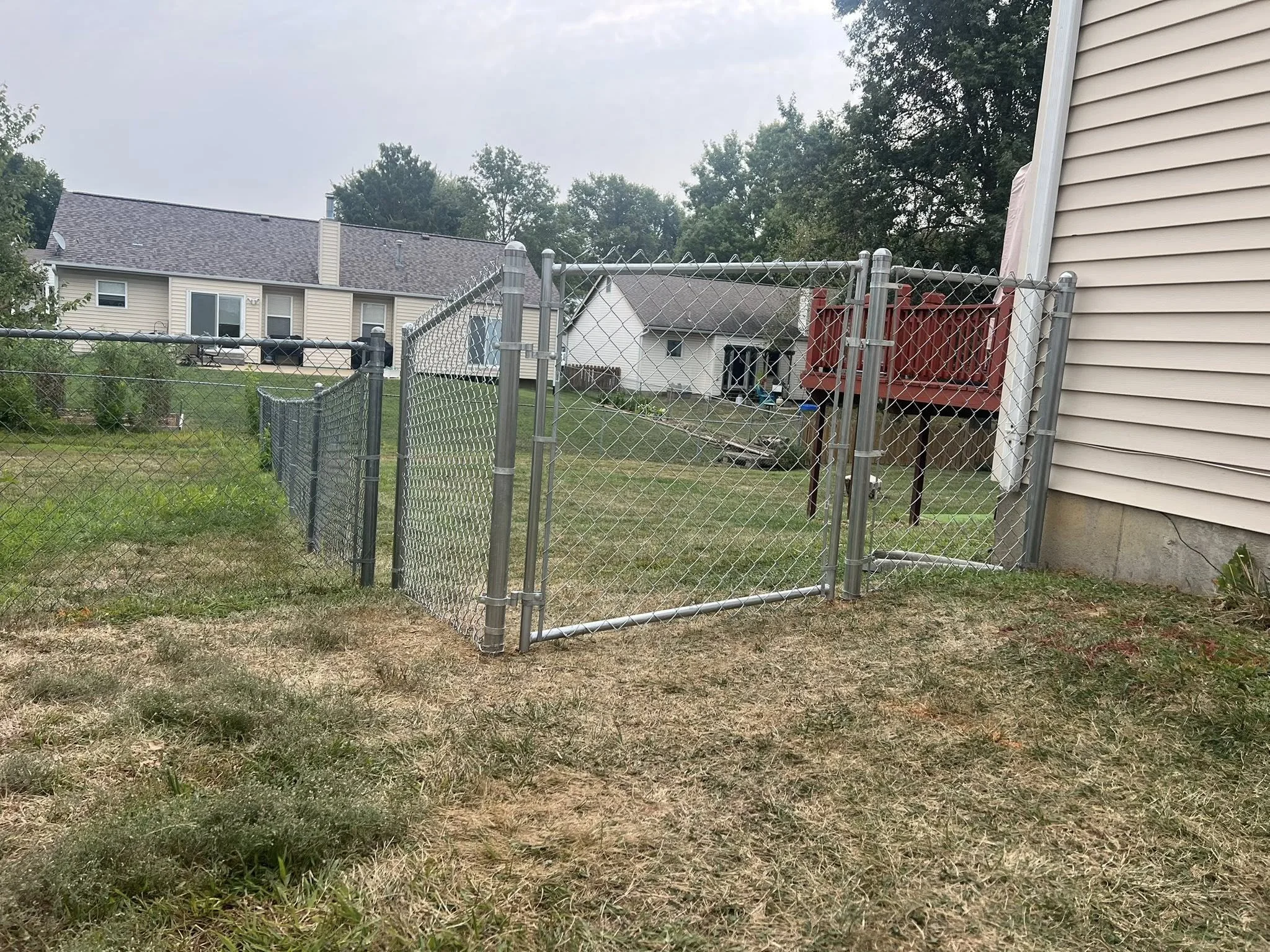 grey chain link fence in backyard - Midwest Fence