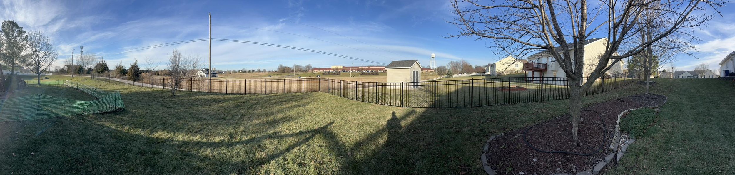 black ornamental aluminum fence in backyard - Midwest Fence