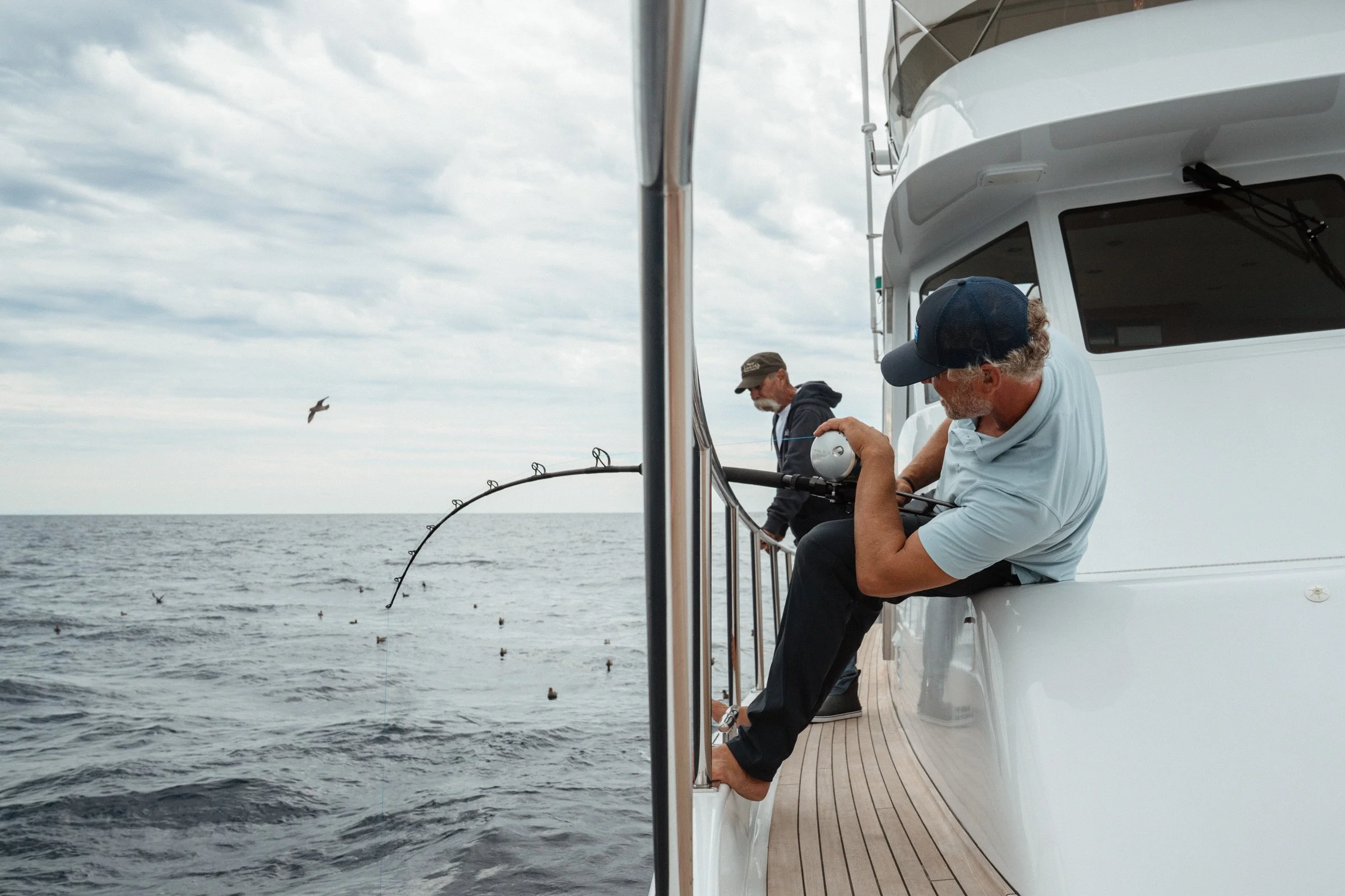 Captain Adam, full lean while Larry looks on. 