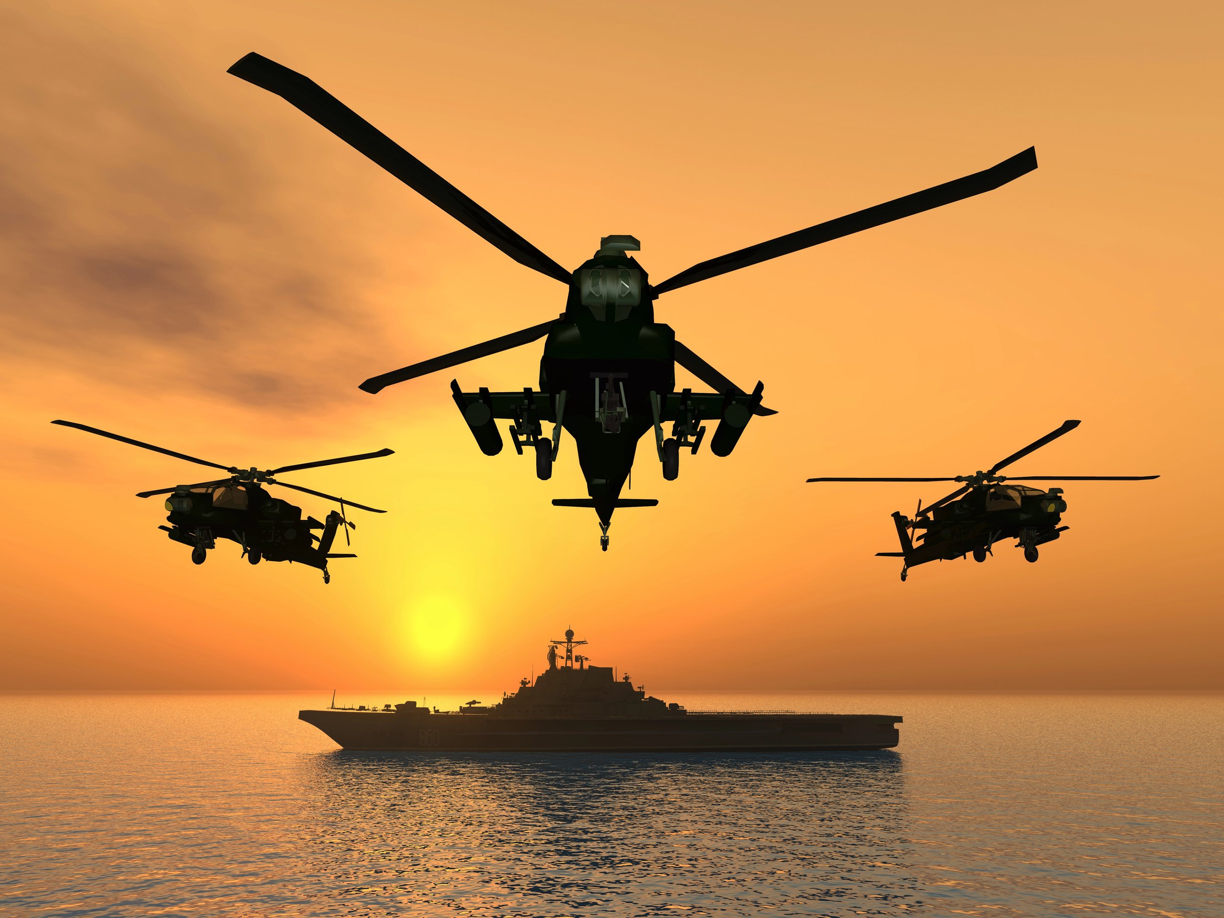 Silhouettes of military helicopters flying in formation during sunset over the ocean, with a large aircraft carrier or battleship on the water below.
