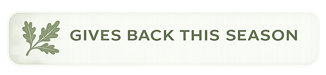 The Benevolent Wolf promotional banner with a light green background, a dark green leafy branch graphic on the left, and the text "GIVES BACK THIS SEASON" in bold uppercase letters in the center.