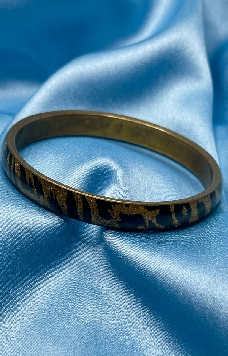 tiger print brass bangle.png